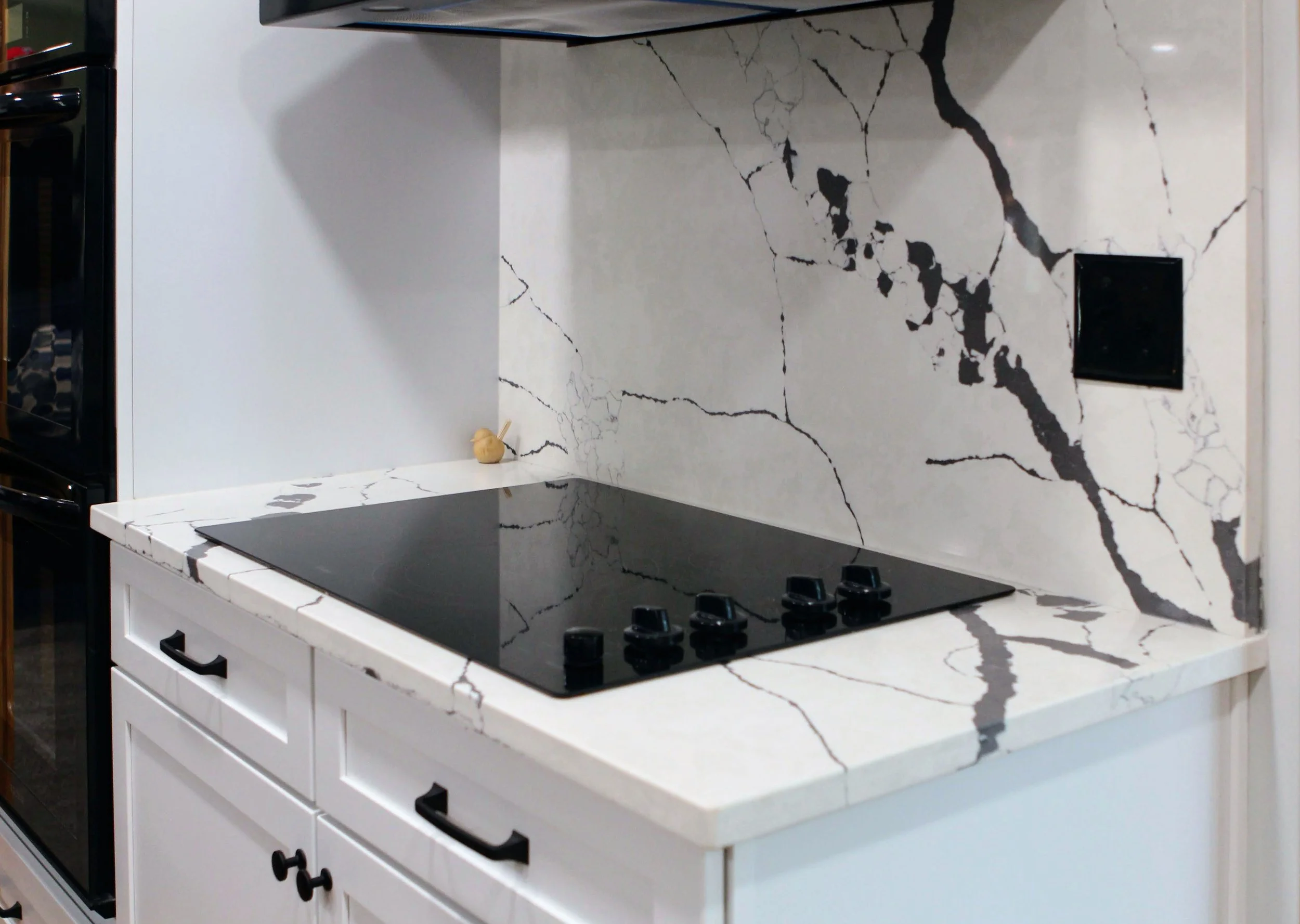 dbg-projects-kitchen-marble-backsplash-range-1.jpg