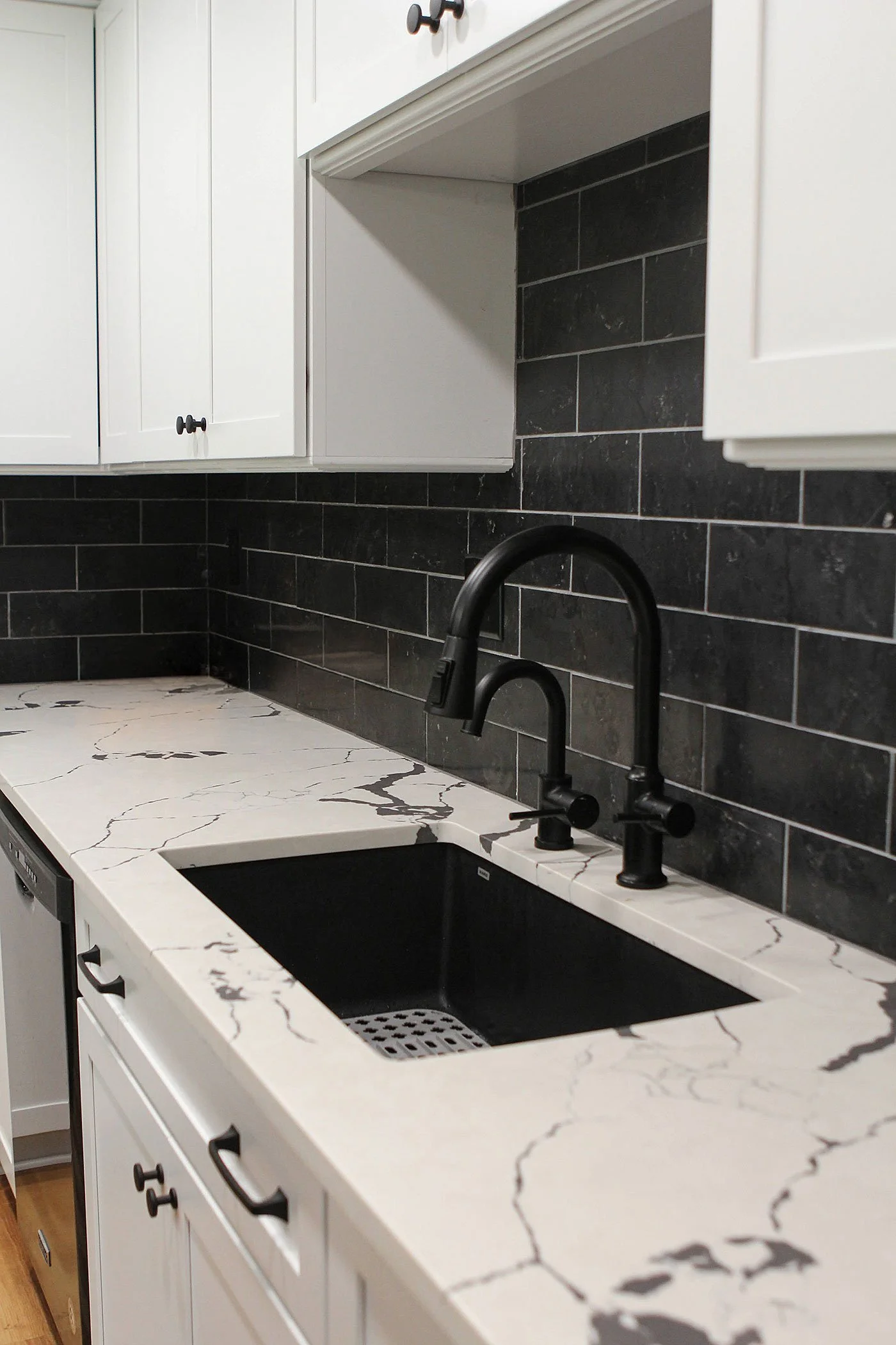 dbg-projects-kitchen-marble-backsplash-sink-1.jpg