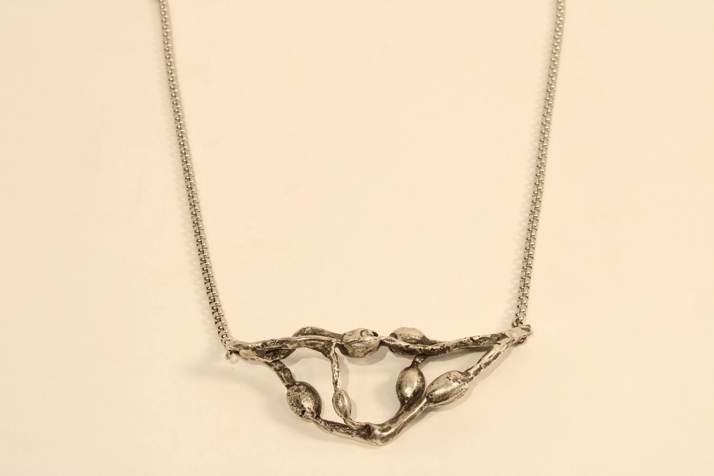 Cast Knotted Wrack. Recycled Sterling Silver, Stainless Chain. 