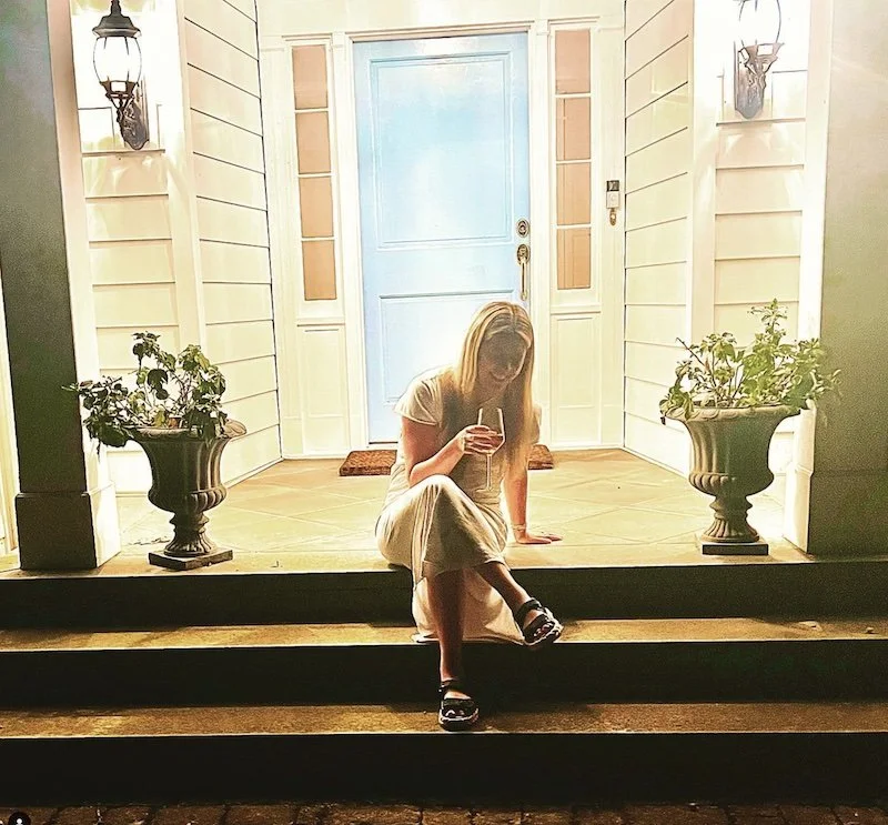 erin sitting on porch at the end of labor day weekend.  erin crawford styles