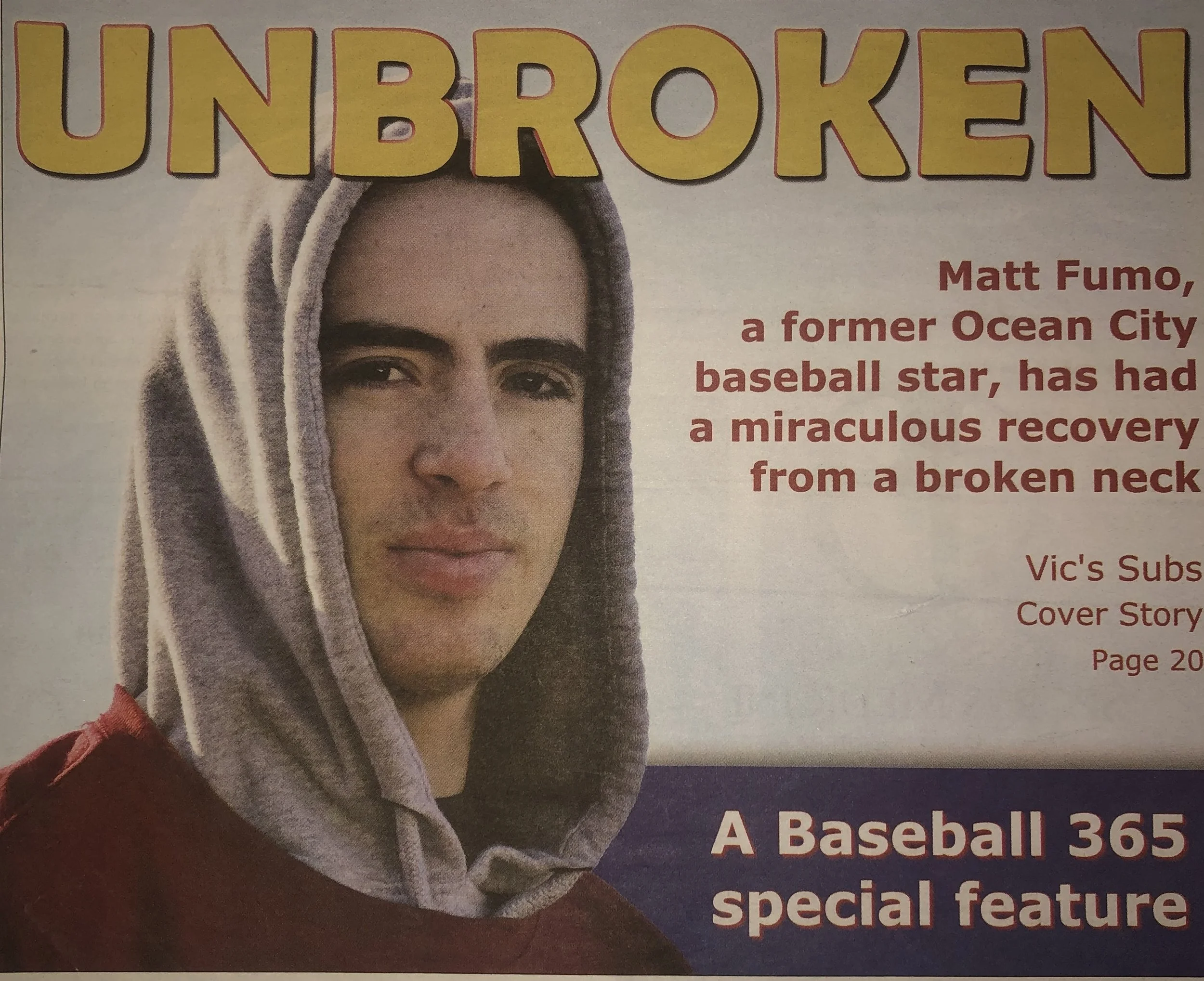 Cover of a magazine featuring Matt Fumo with a short haircut, wearing a hoodie. The cover headline reads 'UNBROKEN' in large yellow letters with a red outline, and smaller text mentions Matt Fumo's miraculous recovery from a broken neck, along with additional content about a baseball feature.