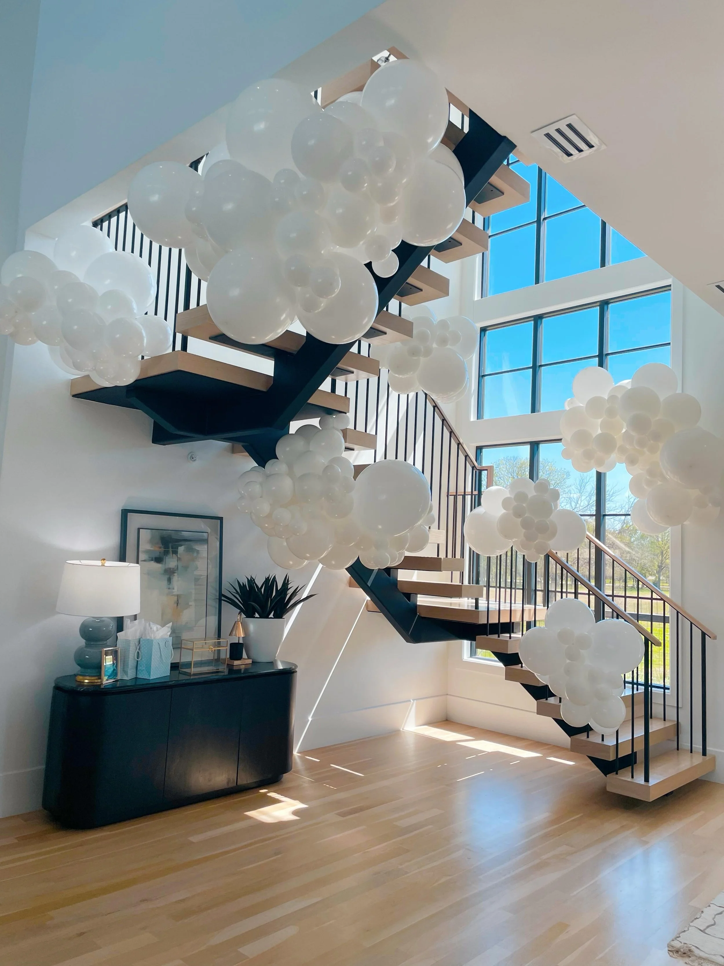 Head in the ☁️. This wonder was created for a baby shower, and we loved seeing mama-to-be gushing over this moment to celebrate her and the new joy coming her way. 

Planner: @silhouette_group 

#balloonclouds #babyshowerballoons #fortworthballoons
