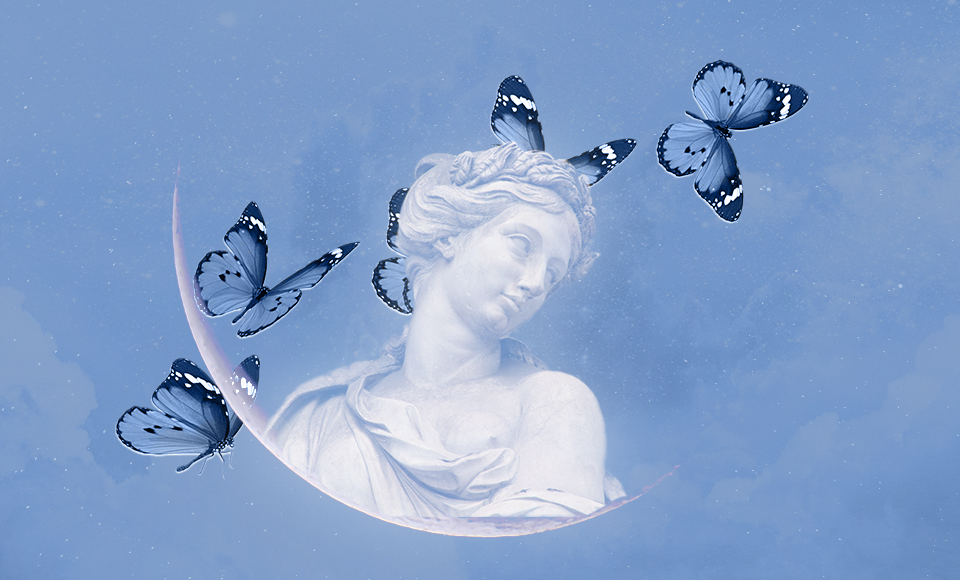 A marble sculpture of a woman surrounded by blue butterflies in a dreamy, sky-like setting with clouds.