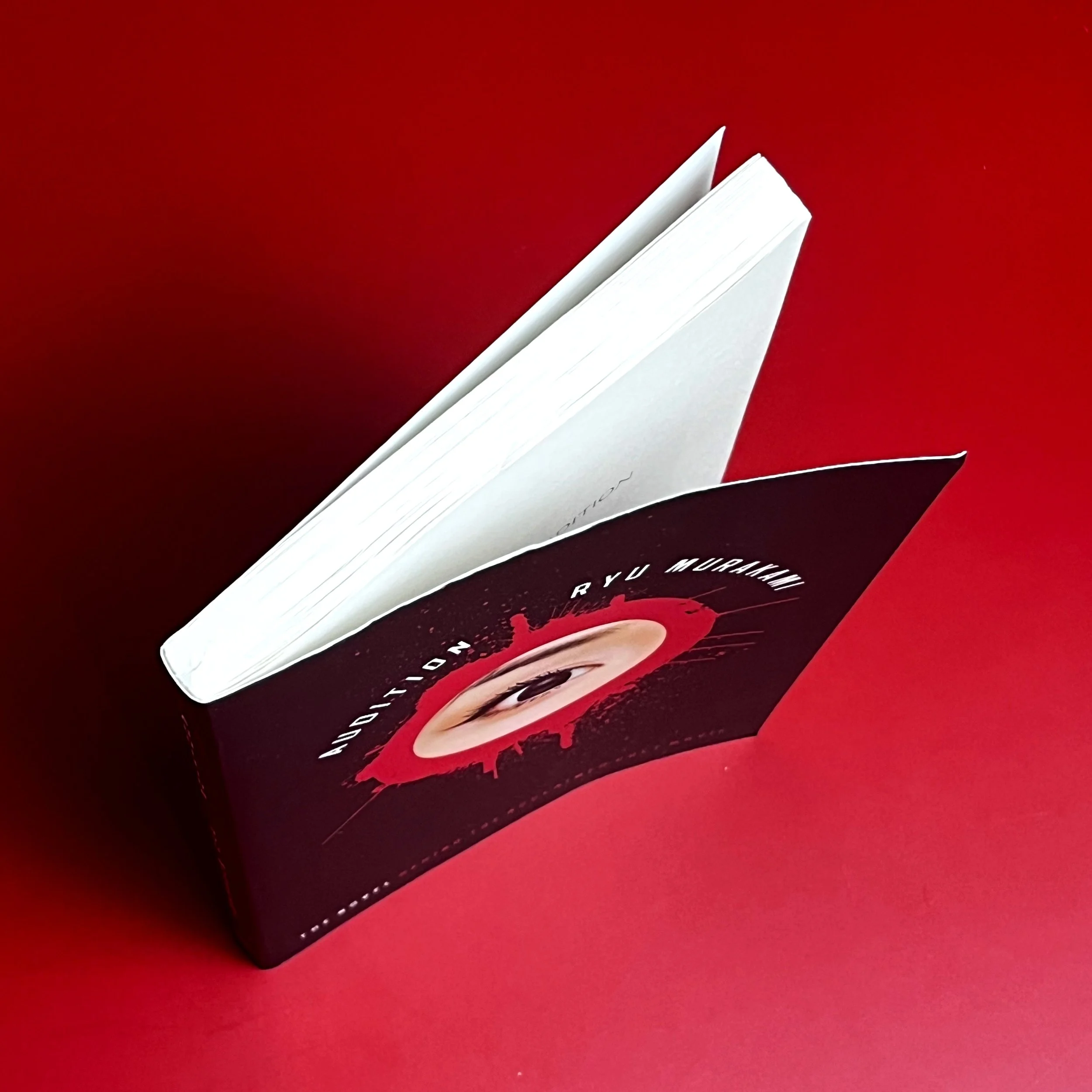 Mild warping to cover that causes upper right corner to bend out from book.