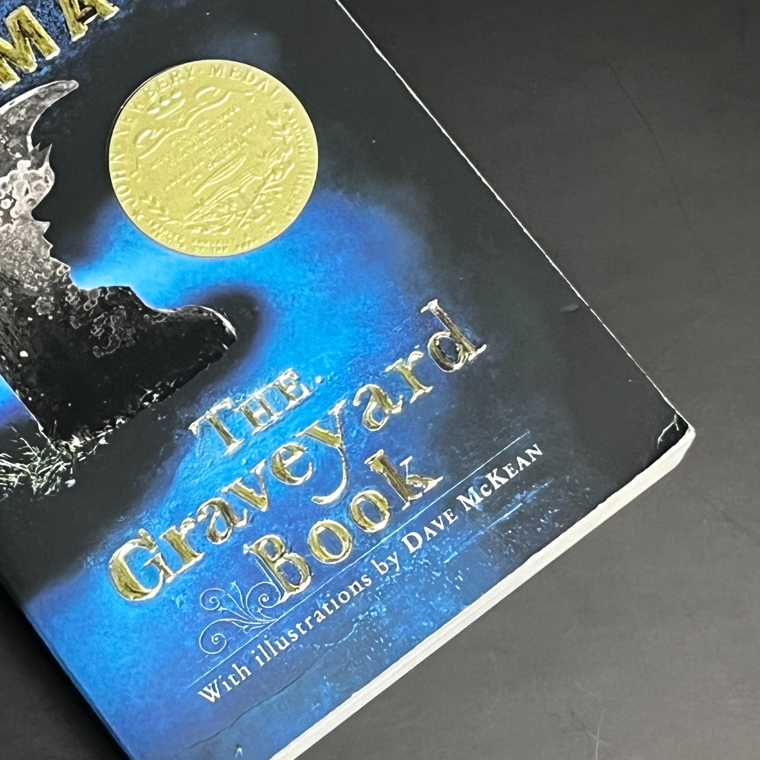 Creased bend on corner of bottom of cover.