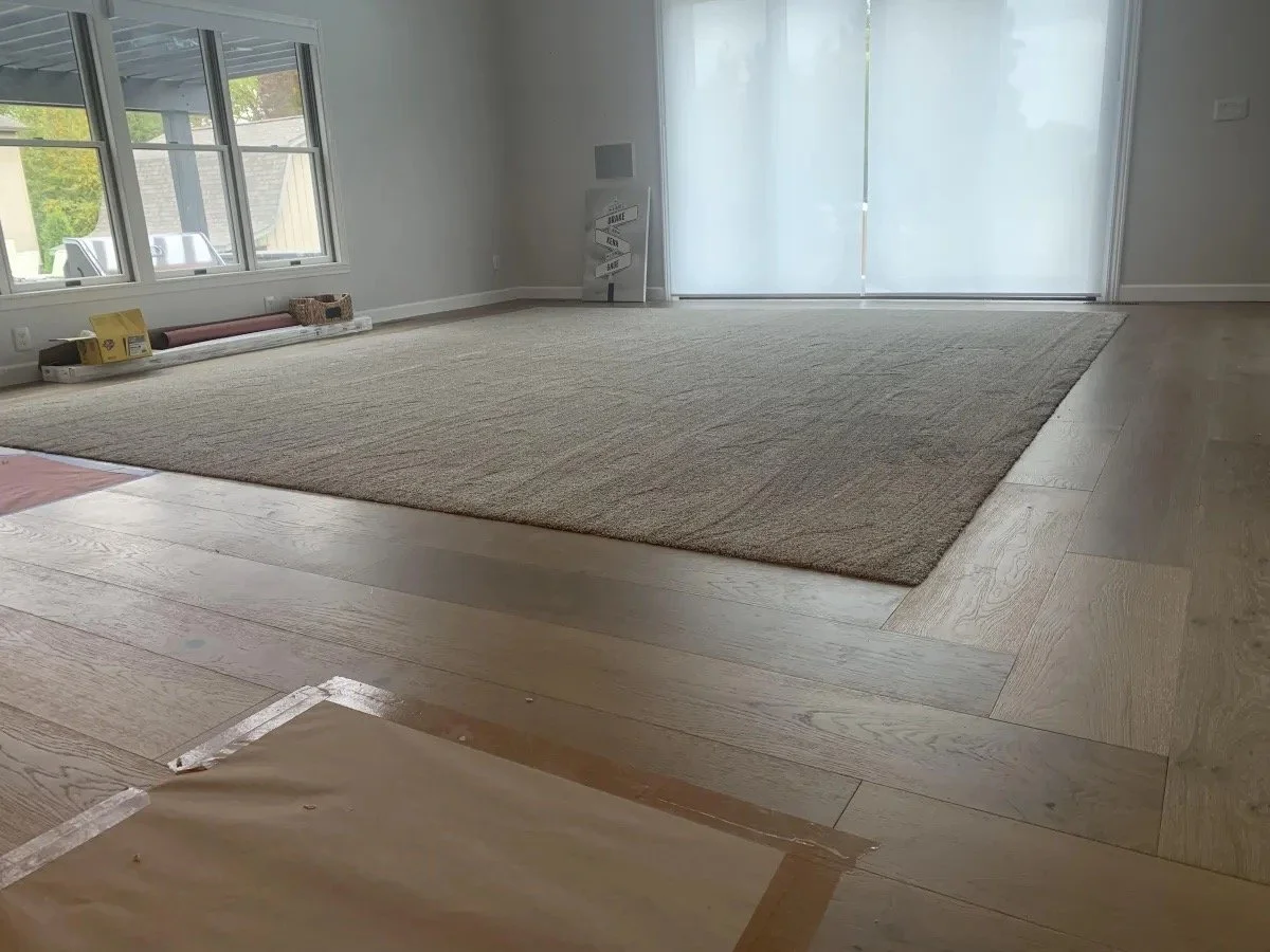 3rd Gen Flooring team installing vinyl plank flooring in Michiana home