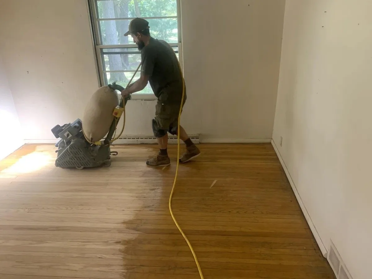 3rd Gen Flooring team sanding hardwood floors in Michiana home