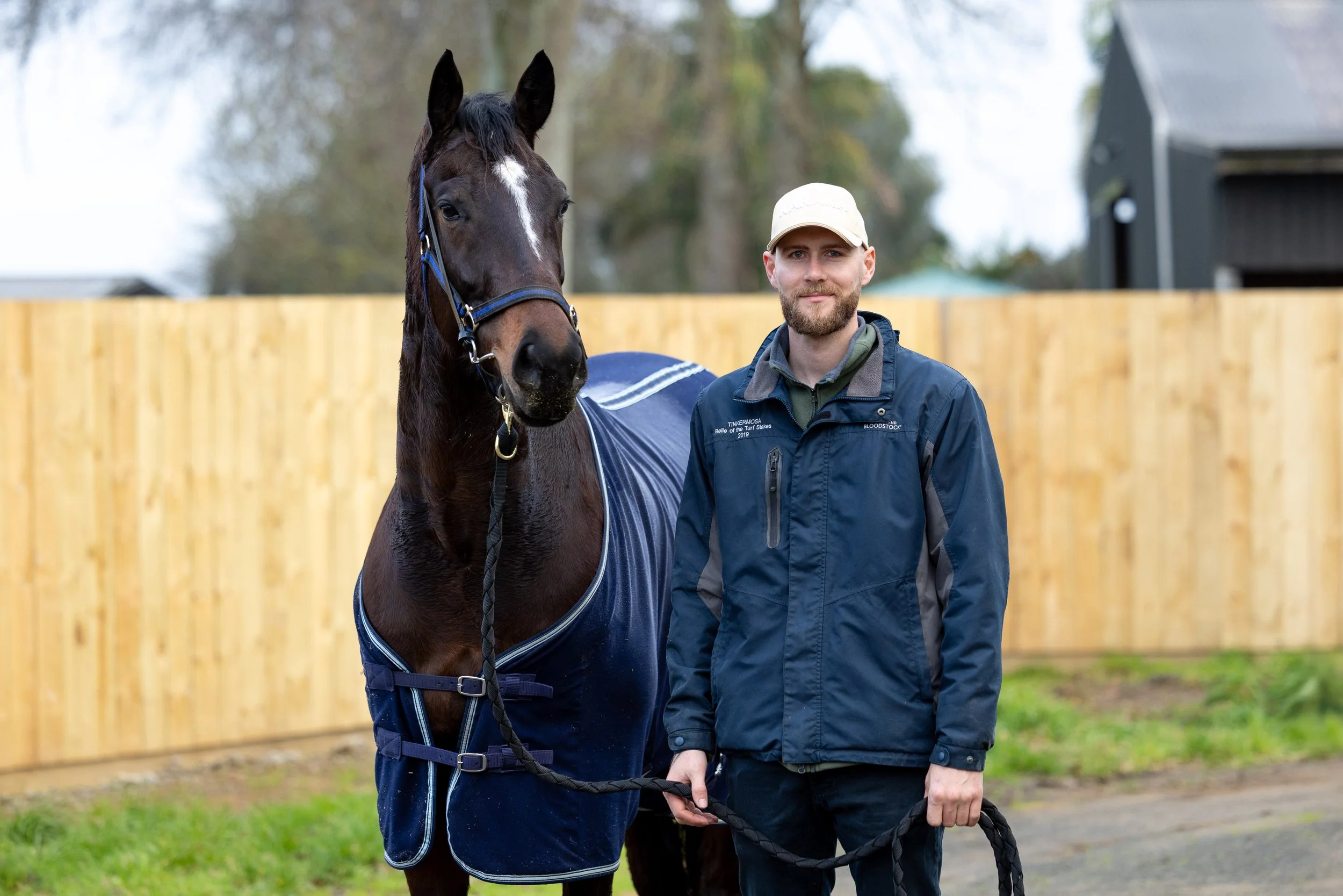 Nick and one of his thoroughbreds at the Patella Racing stables.