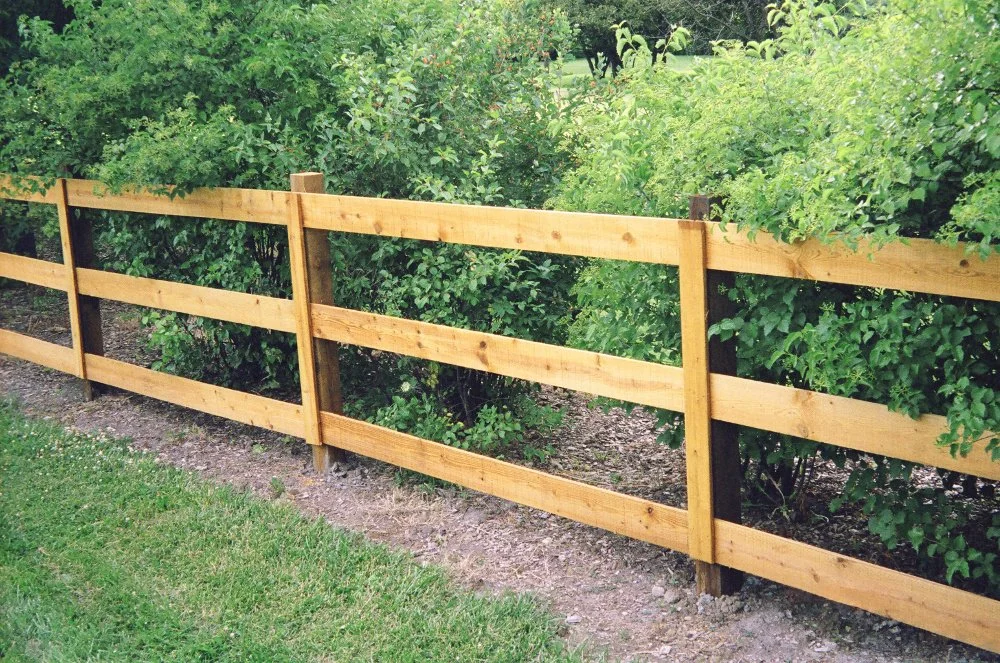 Residential 3-rail post & rail wood fence.jfif