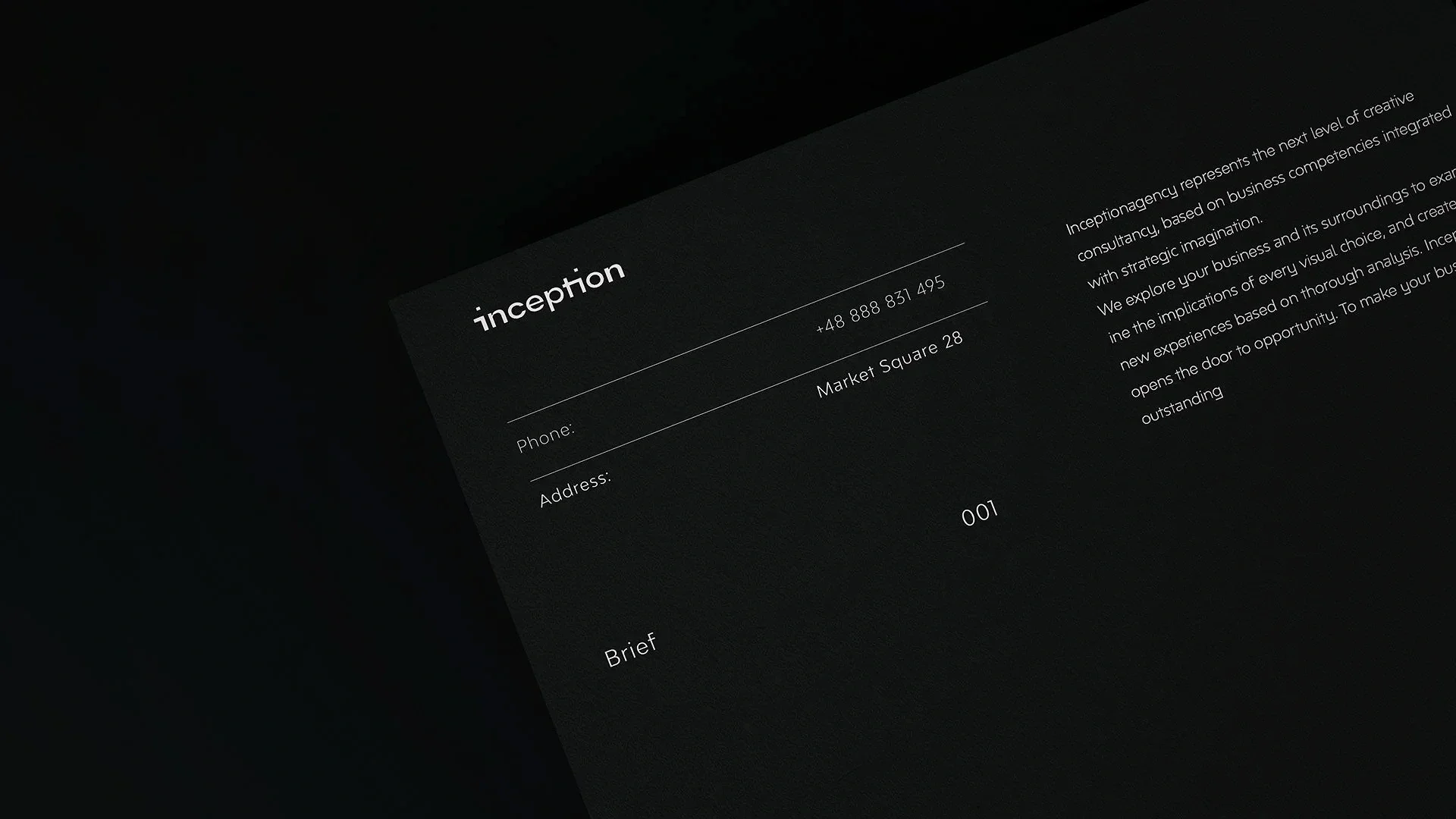 A dark, professional-looking business card for 'inception' with contact details and a brief description printed on it.