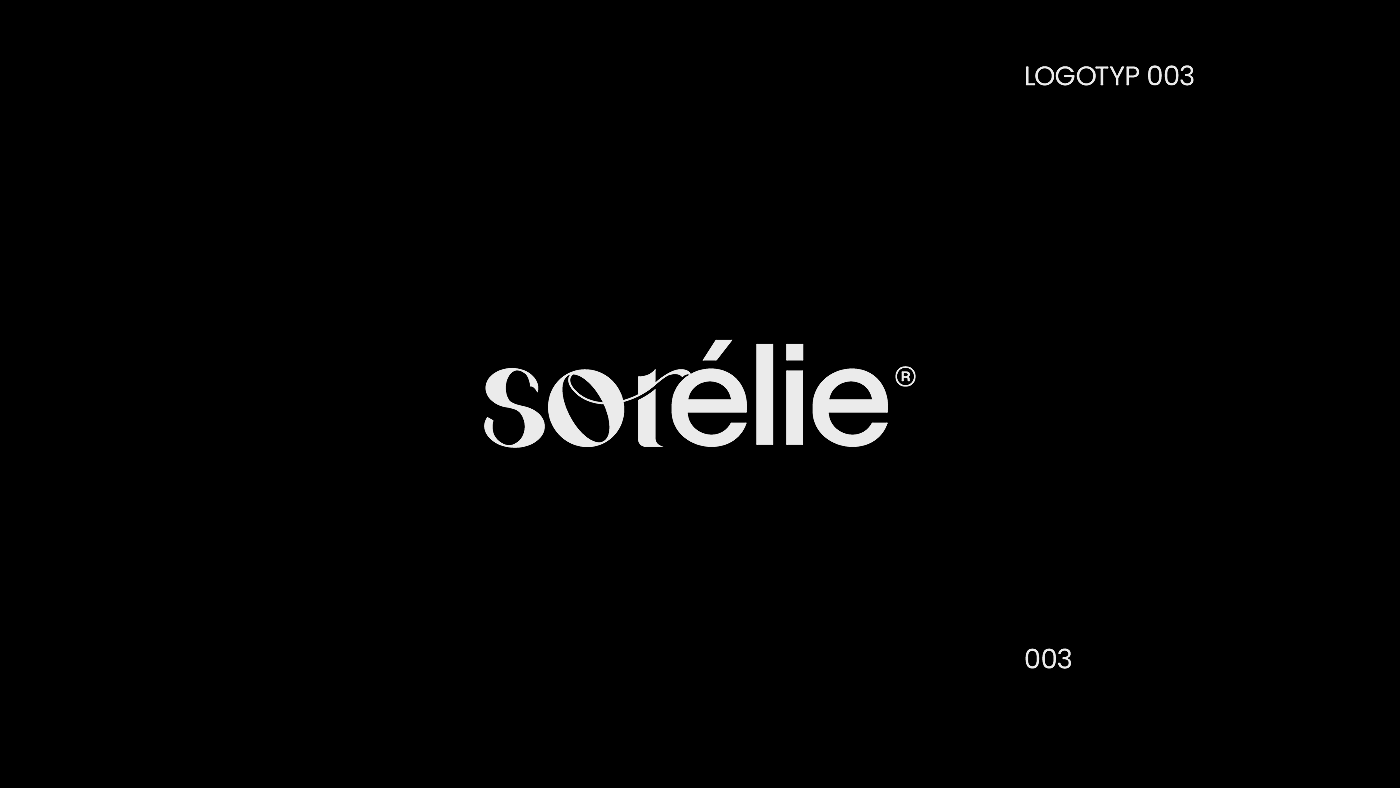 Black background with white text displaying brand name 'sorelié' in stylized font, and the words 'LOGOTYP 003' and '003' in small font at the top and bottom corners respectively.