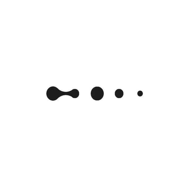 Abstract black dots and shapes progressively decreasing in size on a white background.