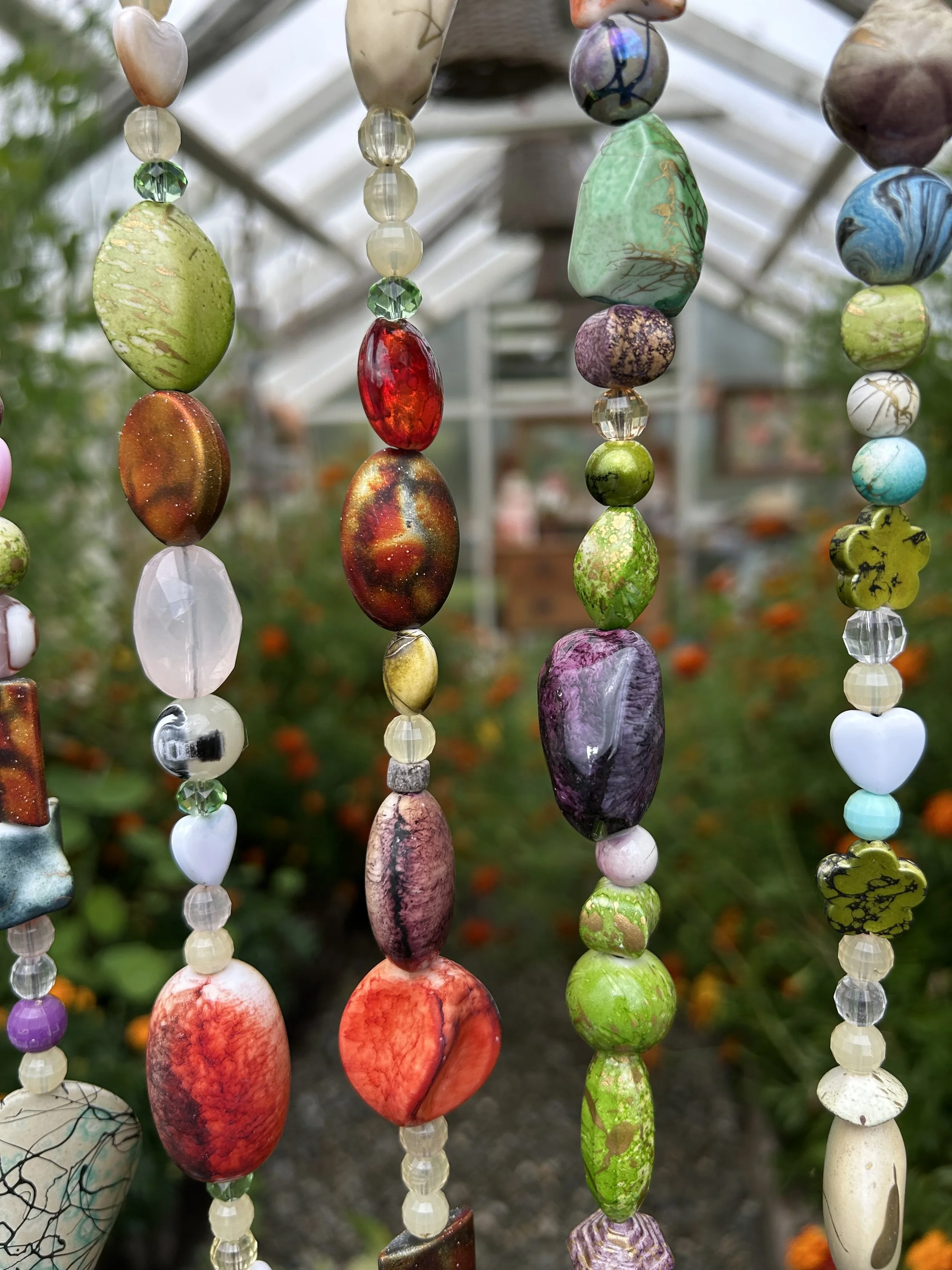 My homemade bead curtain - keeps the birds out of my greenhouse.  
