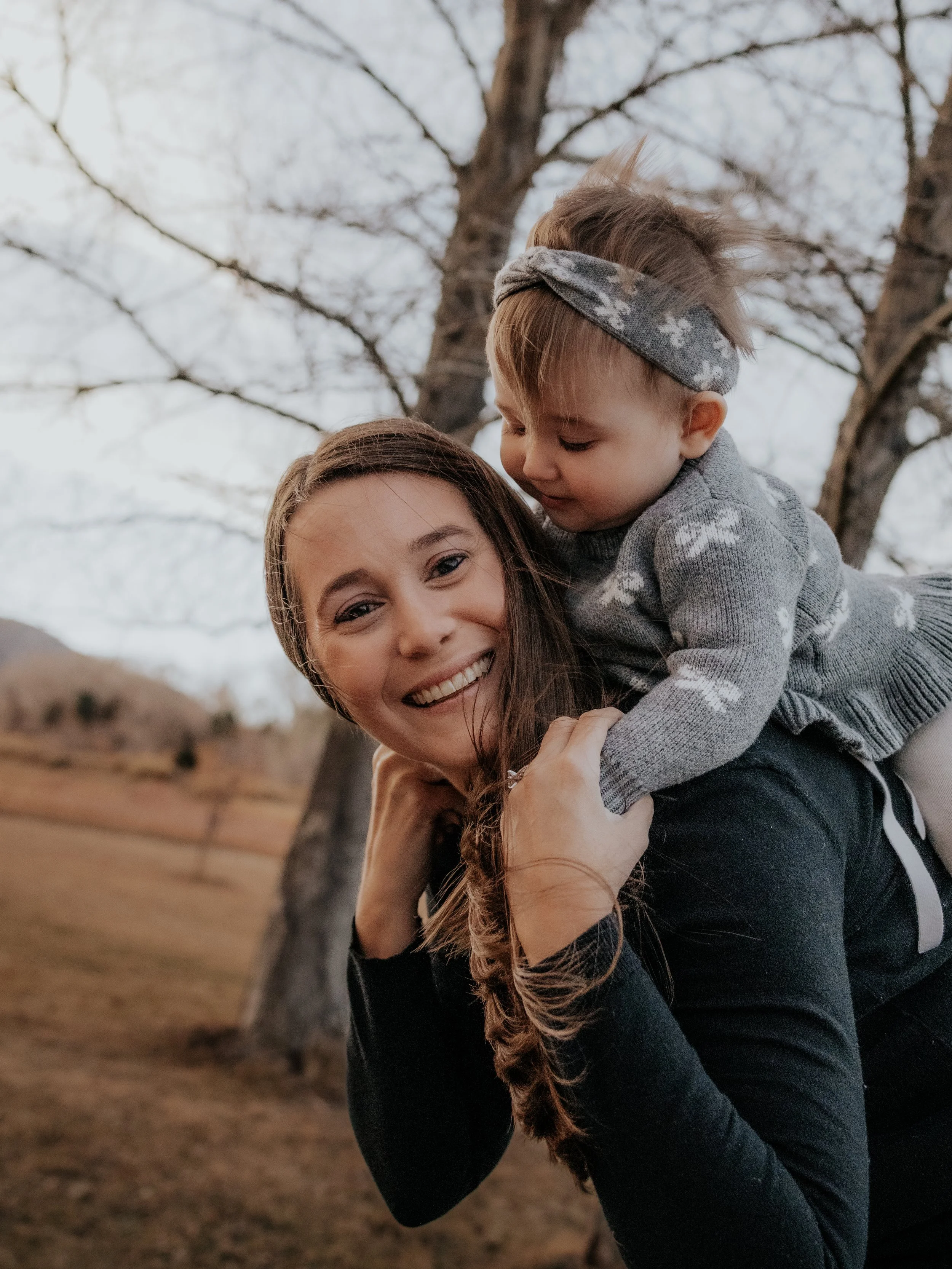 Image of a mother and her daughter in nature photographed by Kiela Rain Photography