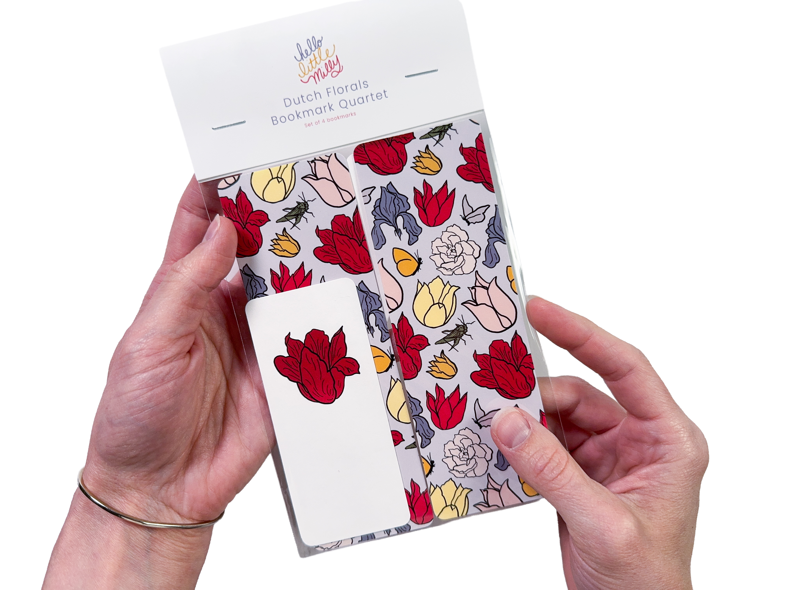 Dutch Florals Bookmark Quartet [packaging with hands].png