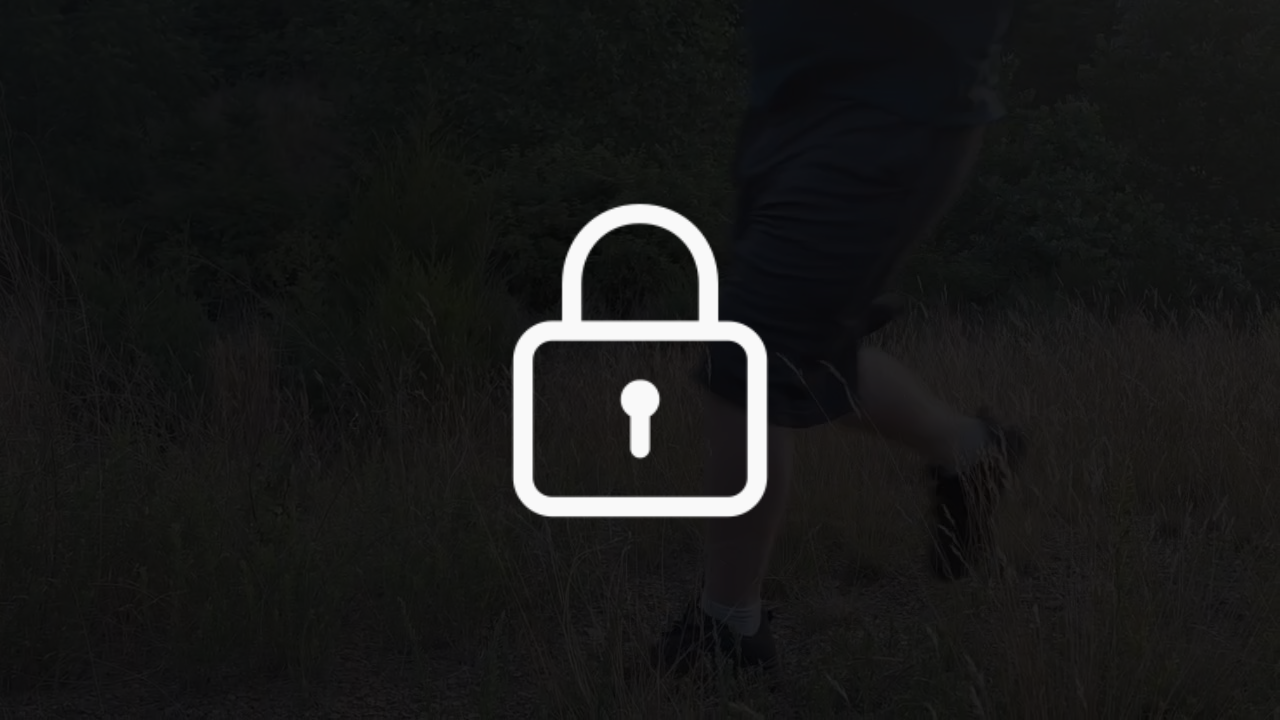 A locked image of Ultra Week Co-Founder, Landon Lesser's legs as he runs along a wooded trail