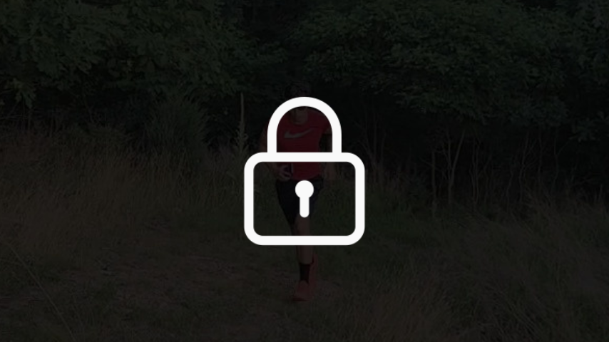 A locked image of Ultra Week Founder, Connor Martin, running towards the camera on a forested trail