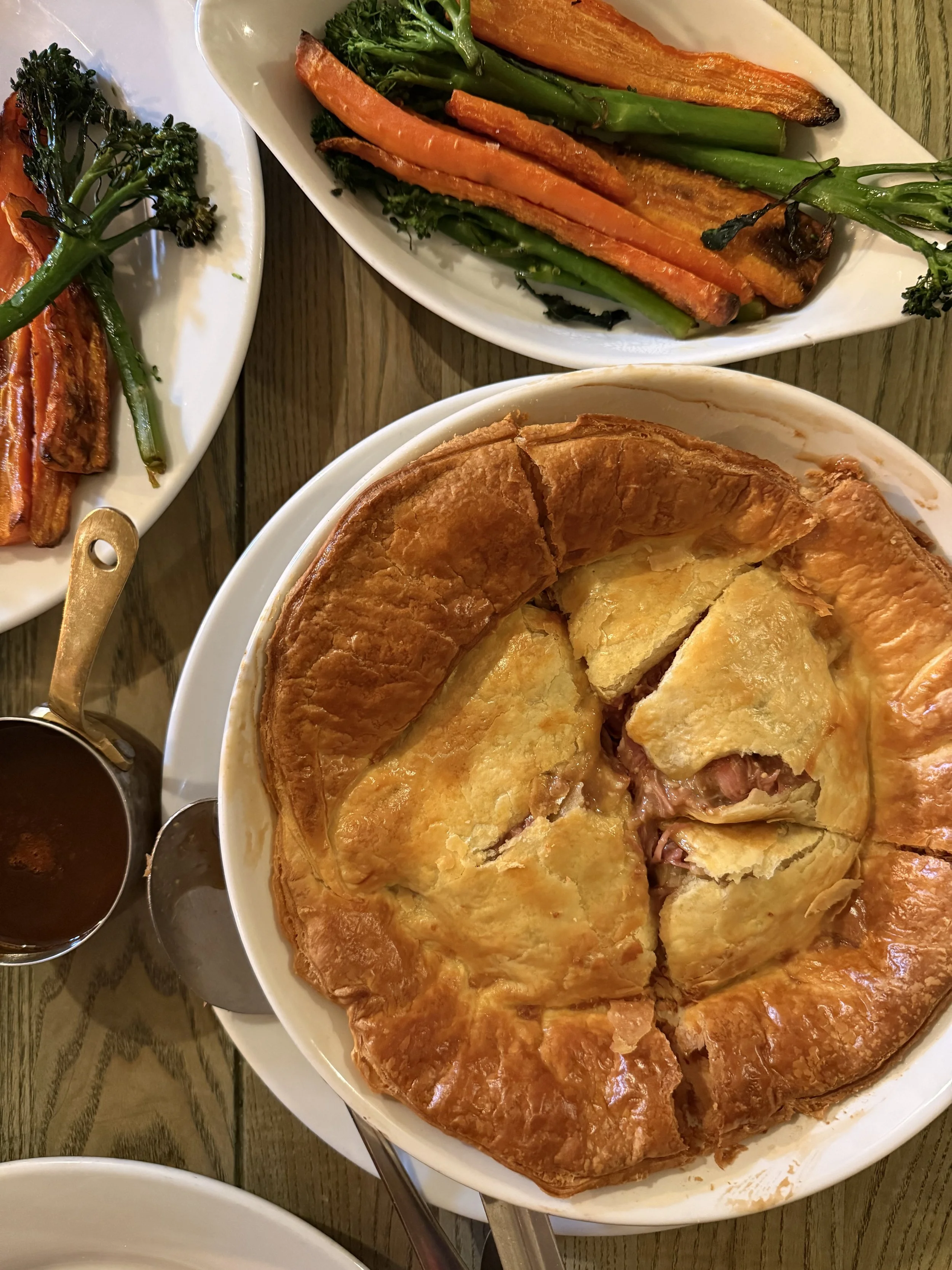 An enormous pot pie for two at The Stag. Comes with roast veg, mash, and gravy. Please & thank you!