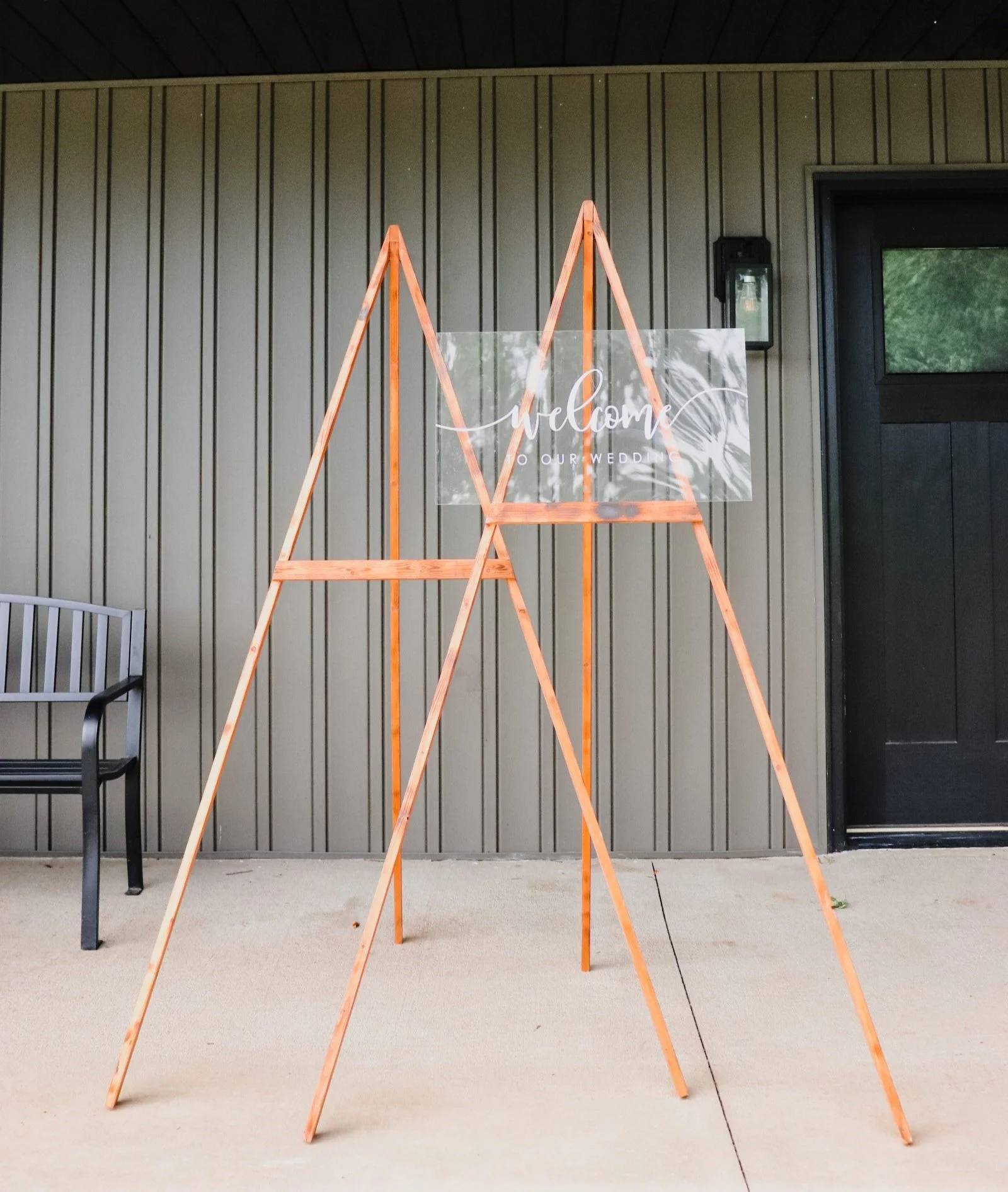 (2) wooden easels for lightweight items only