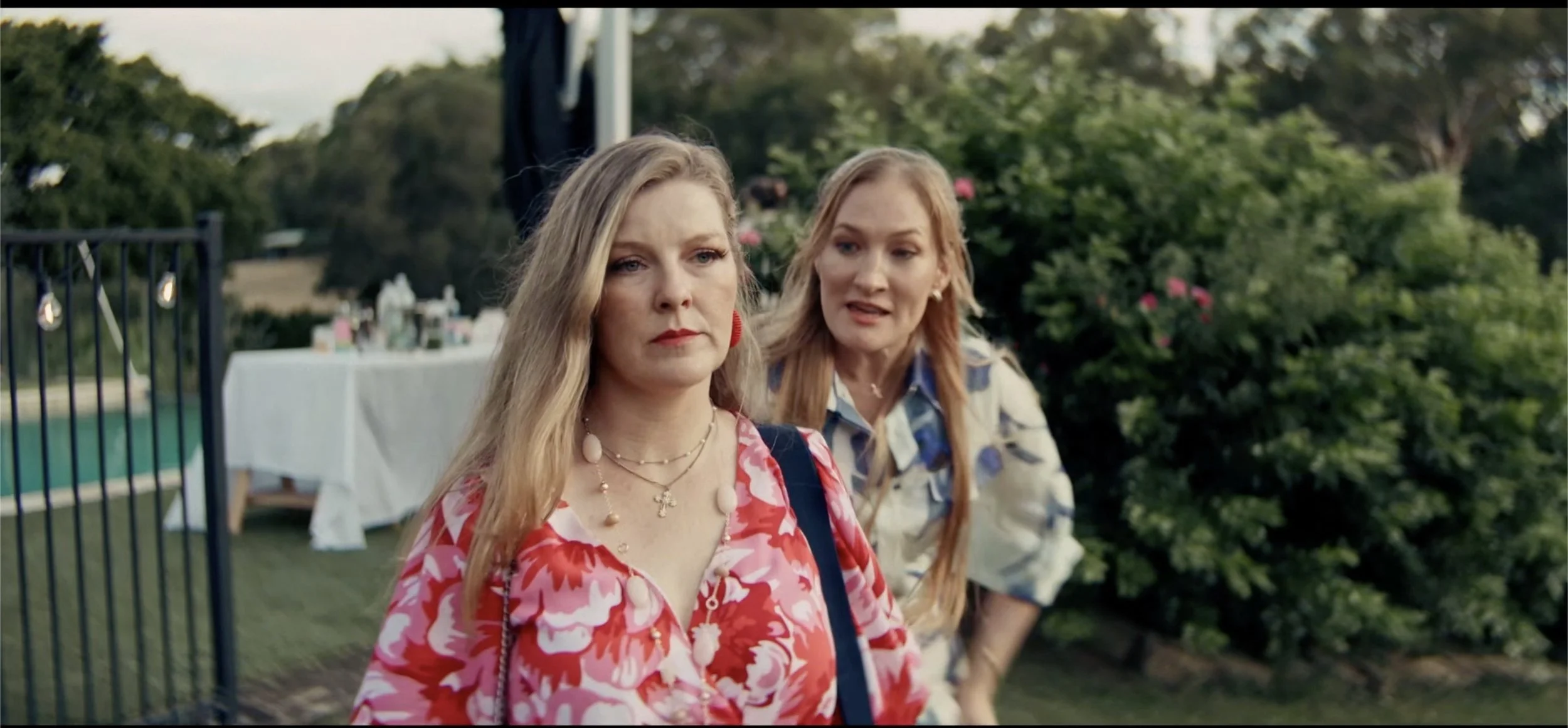 Lara (Felicity Jurd) tries to leave quietly with Natalya (Annisa Belonogoff) hot on heels