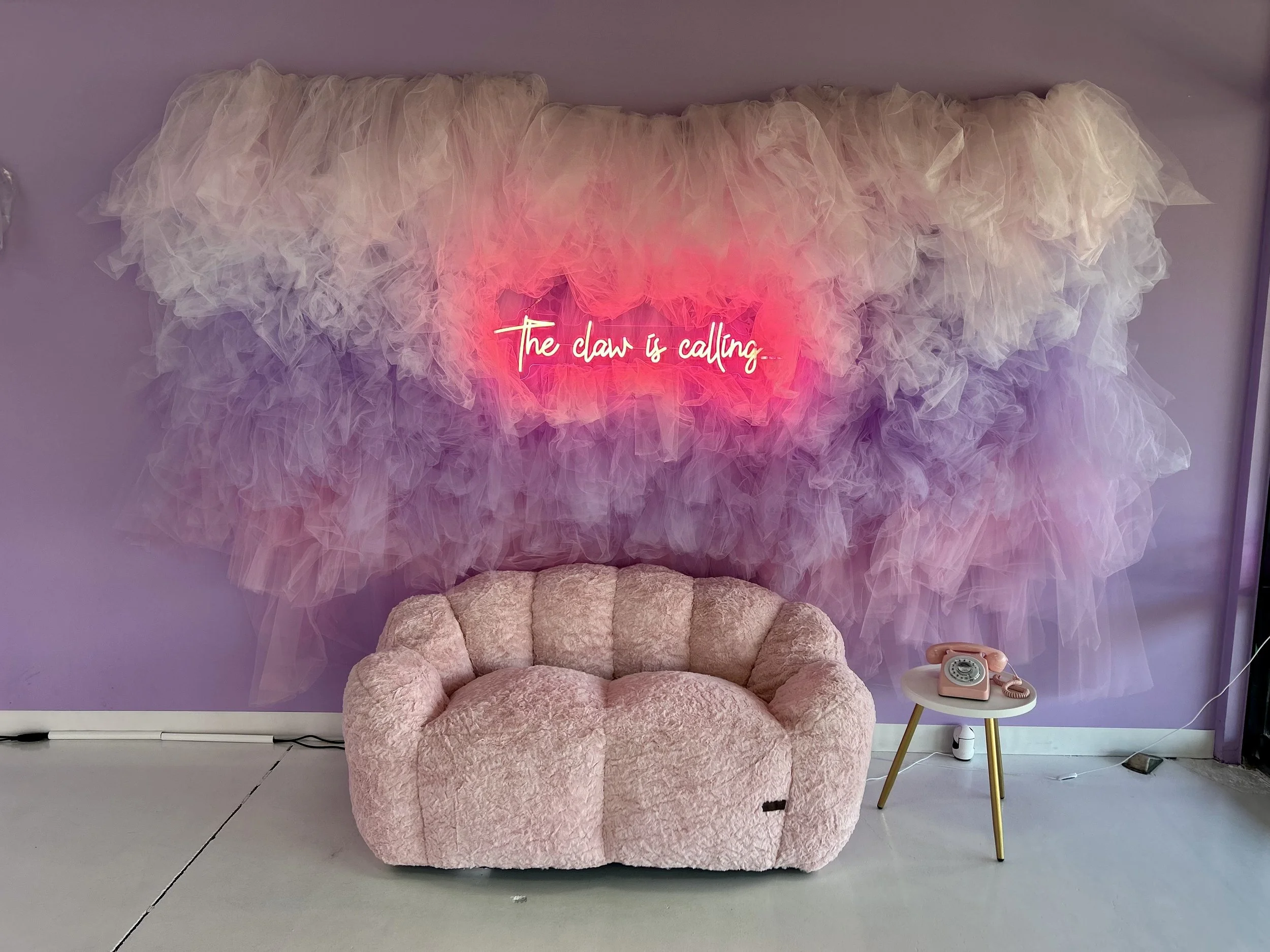 Neon sign: The Claw is Calling