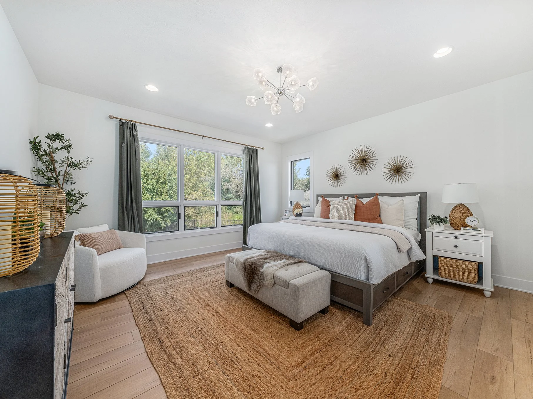 The primary bedroom is a huge selling point for potential buyers and is included in our base staging package.