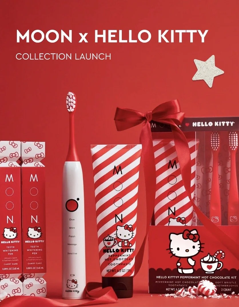 Hello Kitty and Moon brand oral care products with red and white packaging, Christmas-themed boxes, and a gift bag featuring Hello Kitty wearing a red bow, against a red background.