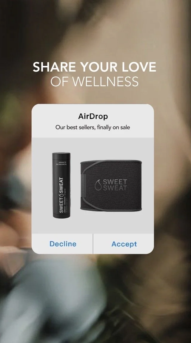 Smartphone screen showing a pop-up offer for Sweat Sweat products, including a tube of sweat smell spray and a black belt, with options to decline or accept.