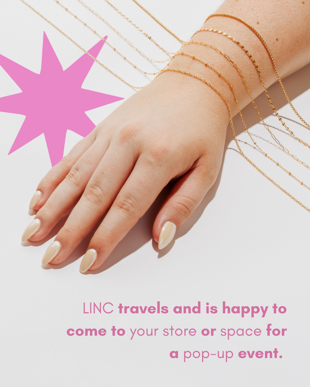 Close-up of a hand and wrist wearing multiple gold and silver layered necklaces with manicured nails, next to a pink starburst graphic, with promotional text about LINC traveling to a store or space for a pop-up event.
