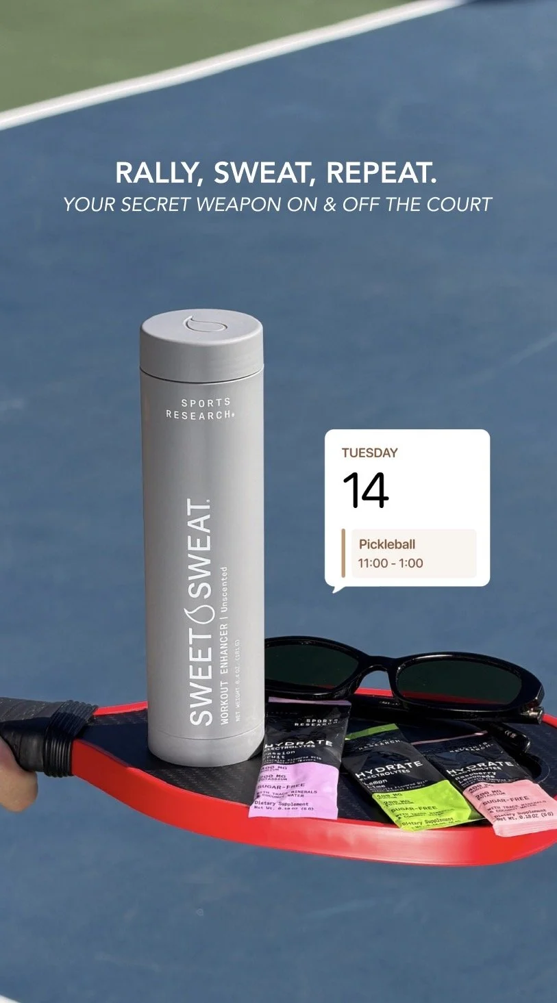 A tennis racket with sunglasses, hydration packs, and a bottle of SWEEET.SWEAT workout enhancer on the racket's head. A digital calendar shows Tuesday, 14th, with an appointment for pickleball from 11:00 to 1:00. The background is a tennis court.