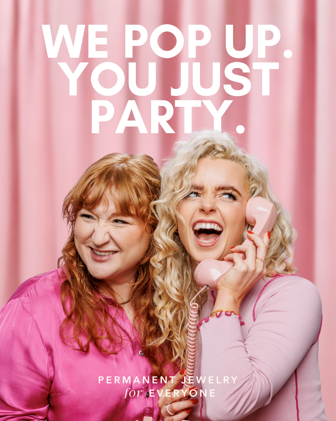 Two women with curly hair, one with blonde hair and the other with red hair, are smiling and using a pink telephone against a pink curtain background. The text says, 'We pop up. You just party.' and 'Permanent jewelry for everyone'.