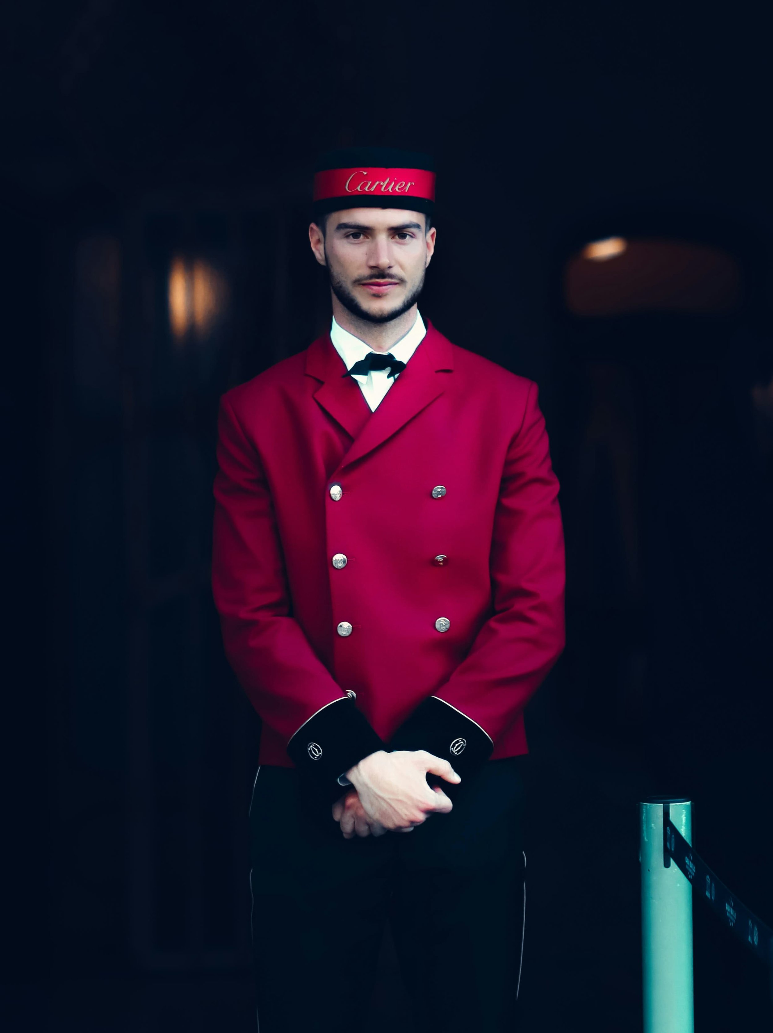Luxury hotel concierge in signature uniform — premium hotel recruitment specialists Australia