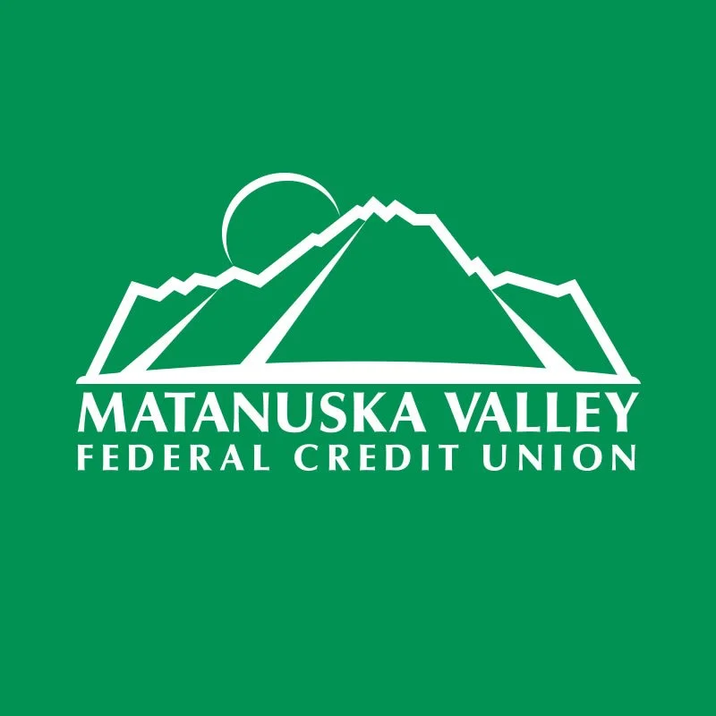 Logo of Matanuska Valley Federal Credit Union featuring stylized mountains and a rising or setting sun on a green background.