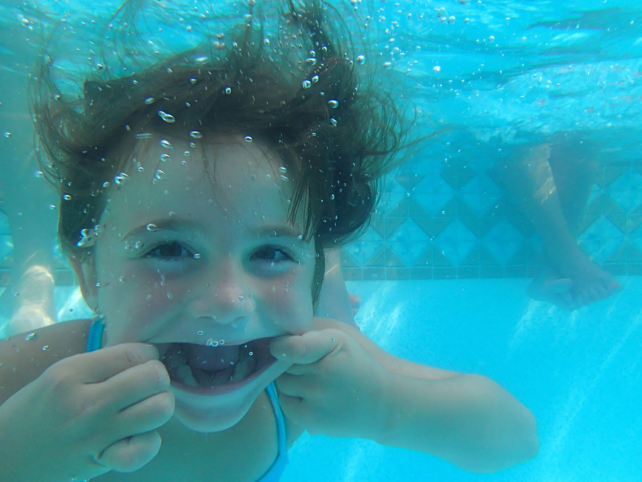 Is it really cleaner to swim in a pool or the lake?