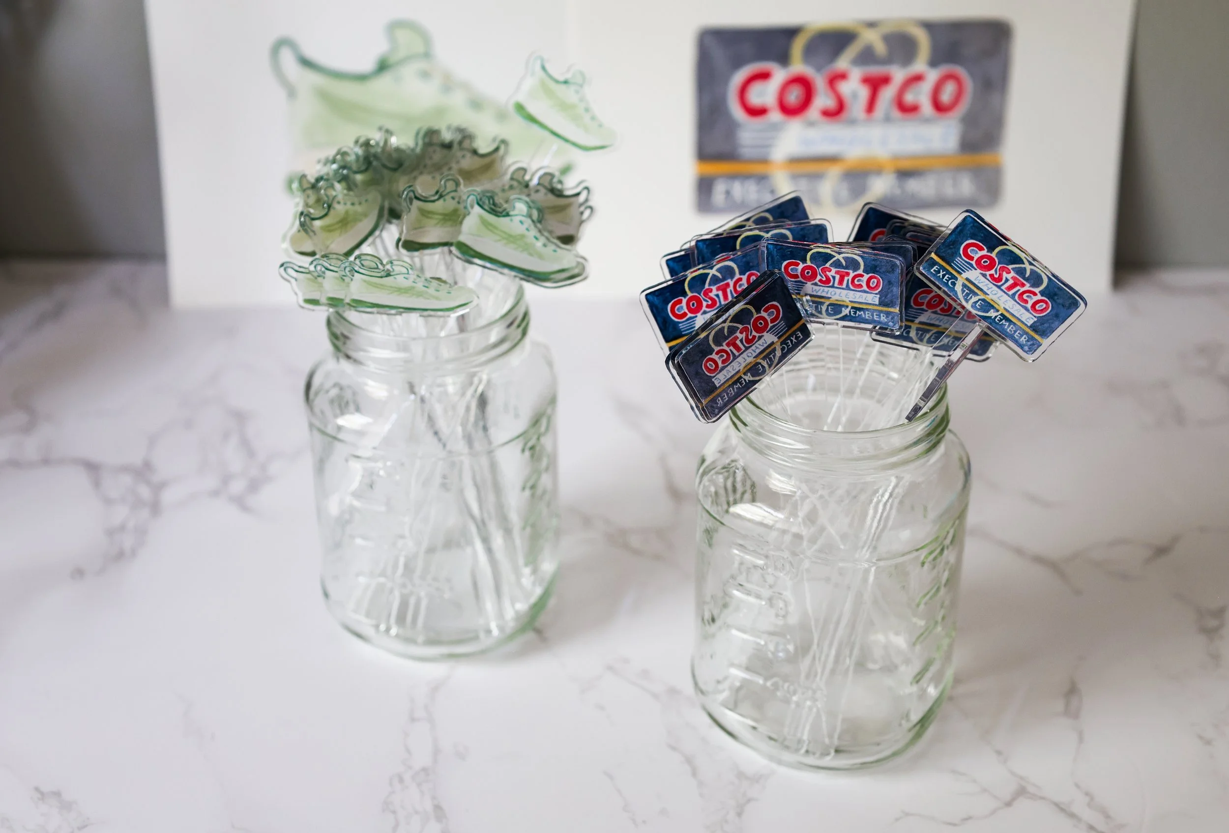 Cocktail Stir Sticks shaped like running shoes and costco membership card