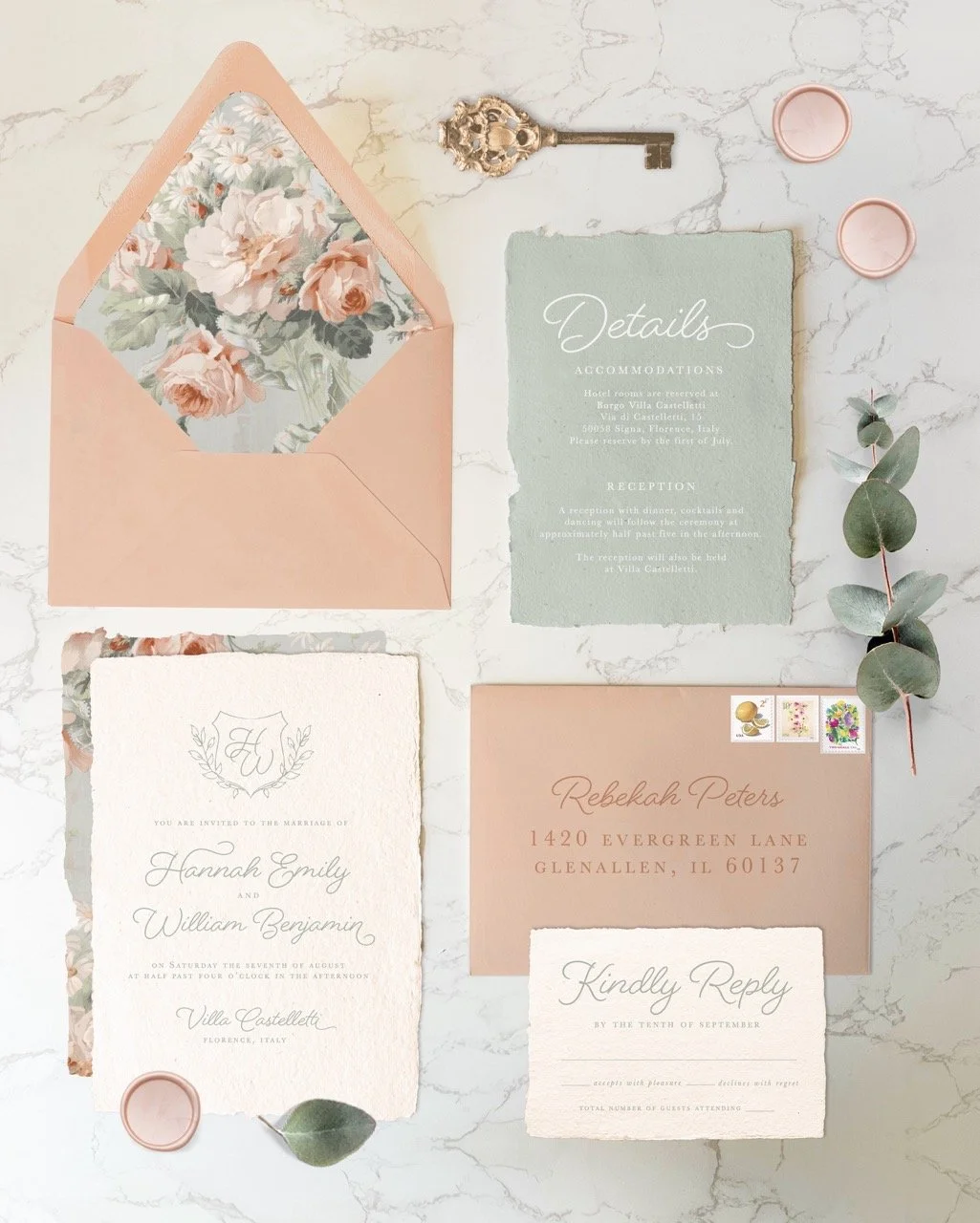 Set of wedding invitations and stationery with floral and elegant design, including an envelope, RSVP card, reception details card, and an invite to the marriage of Hannah Emily and William Benjamin, arranged on a marble surface with eucalyptus leave