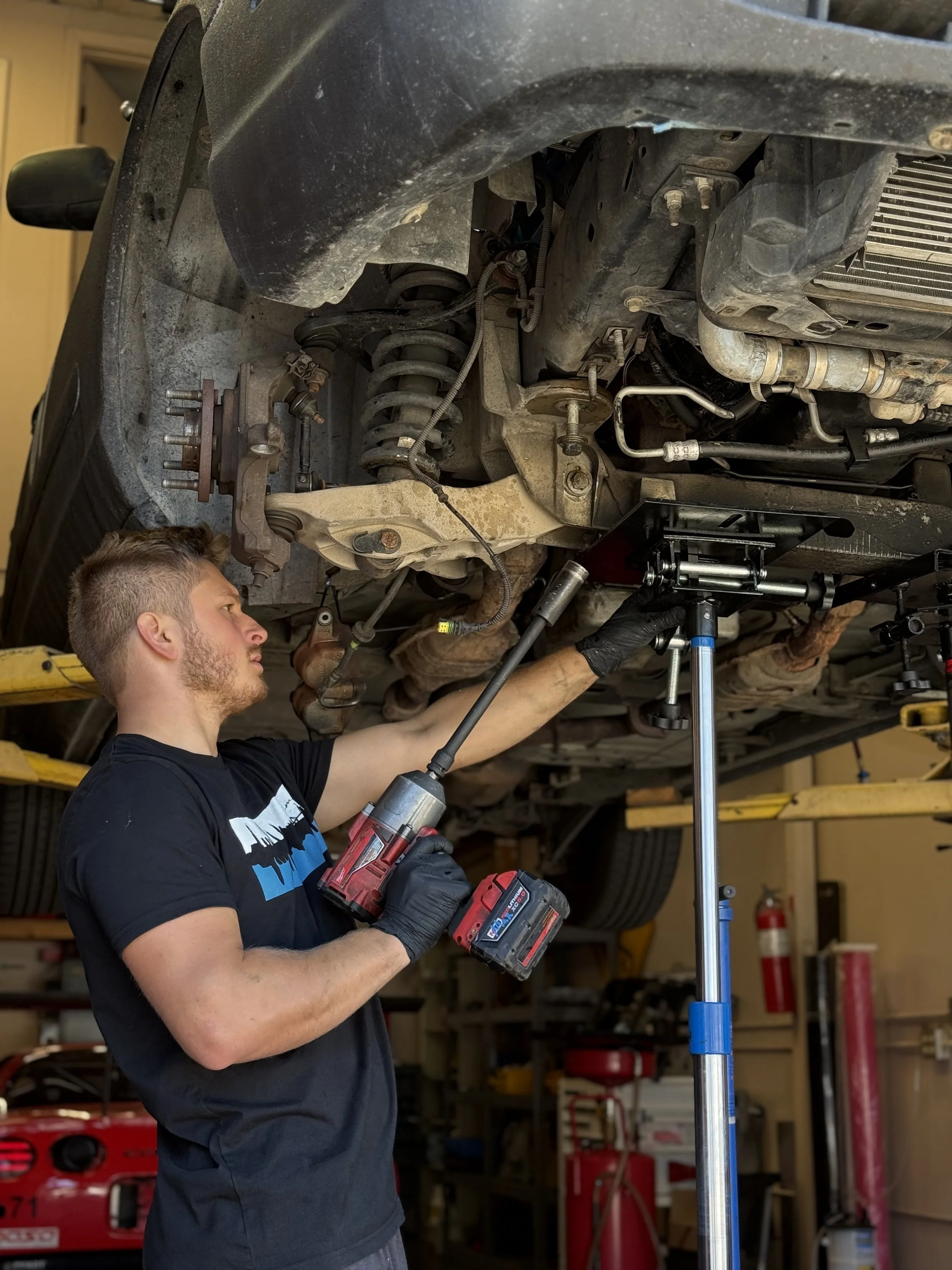 Our head tech working on a customer vehicle with great care