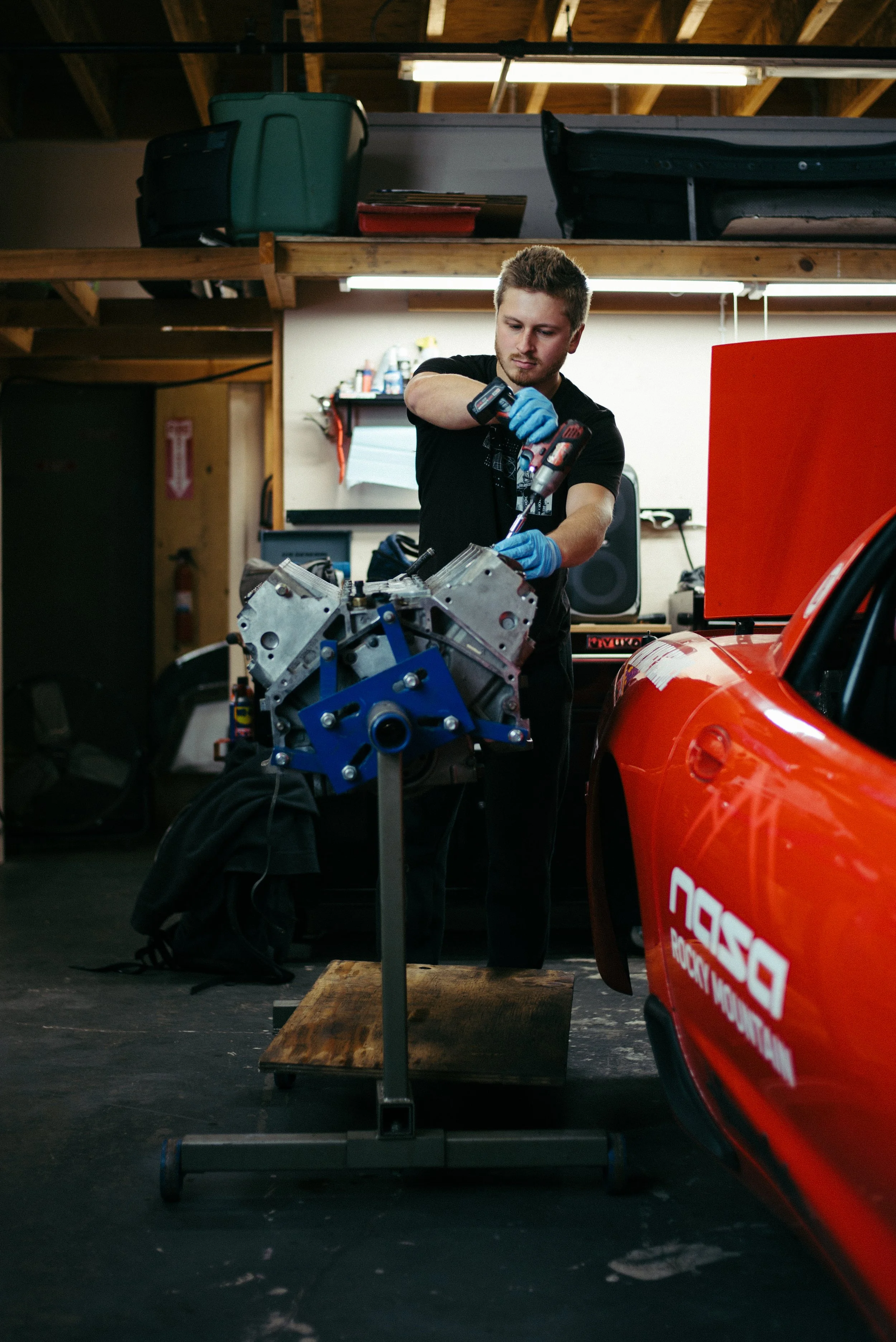 Our head technician working on an LS1 motor that is out of the C5 Corvette