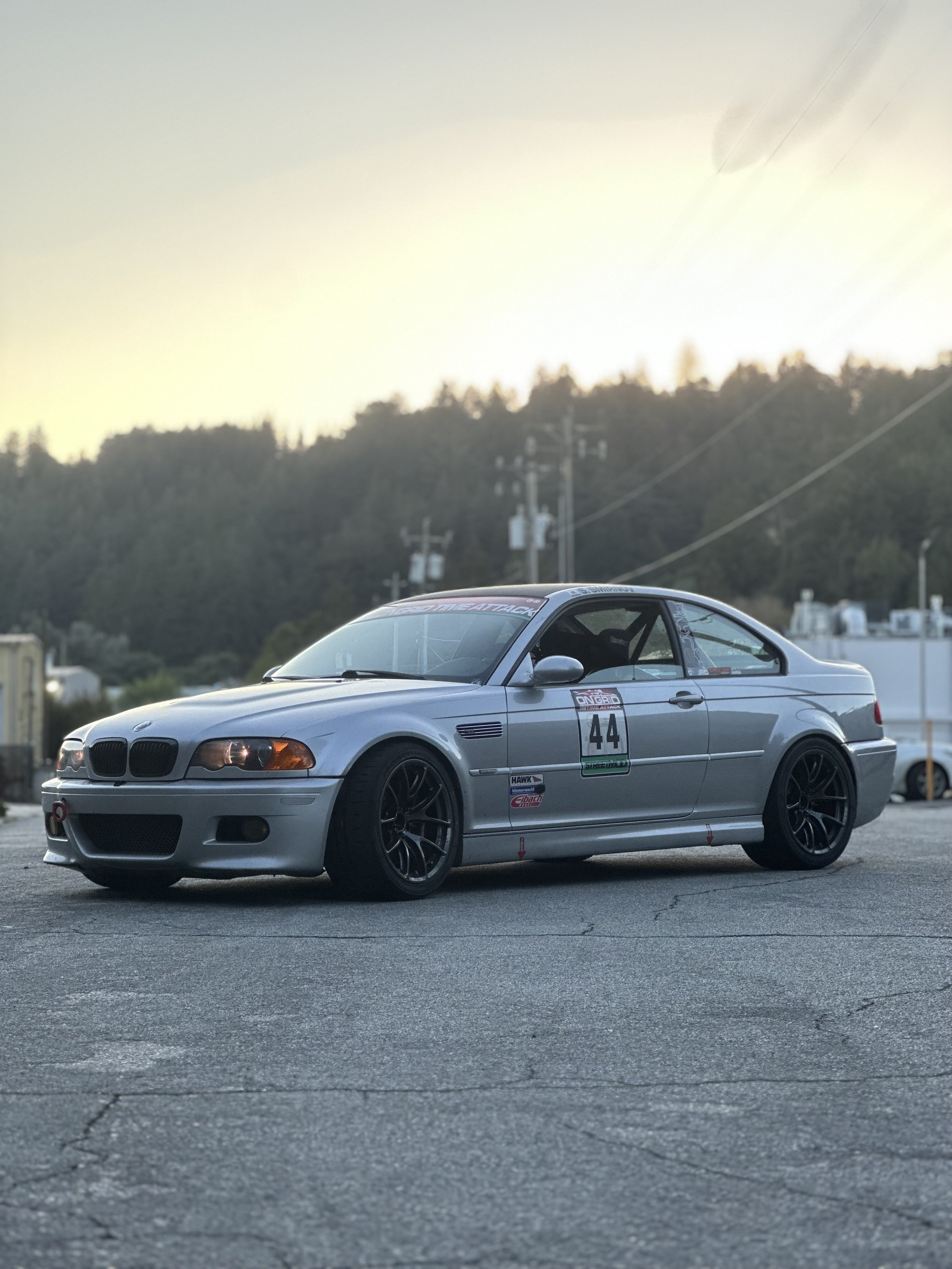 A client's caged E46 M3 that is streetable, after work was done to its suspension to improve handling and grip