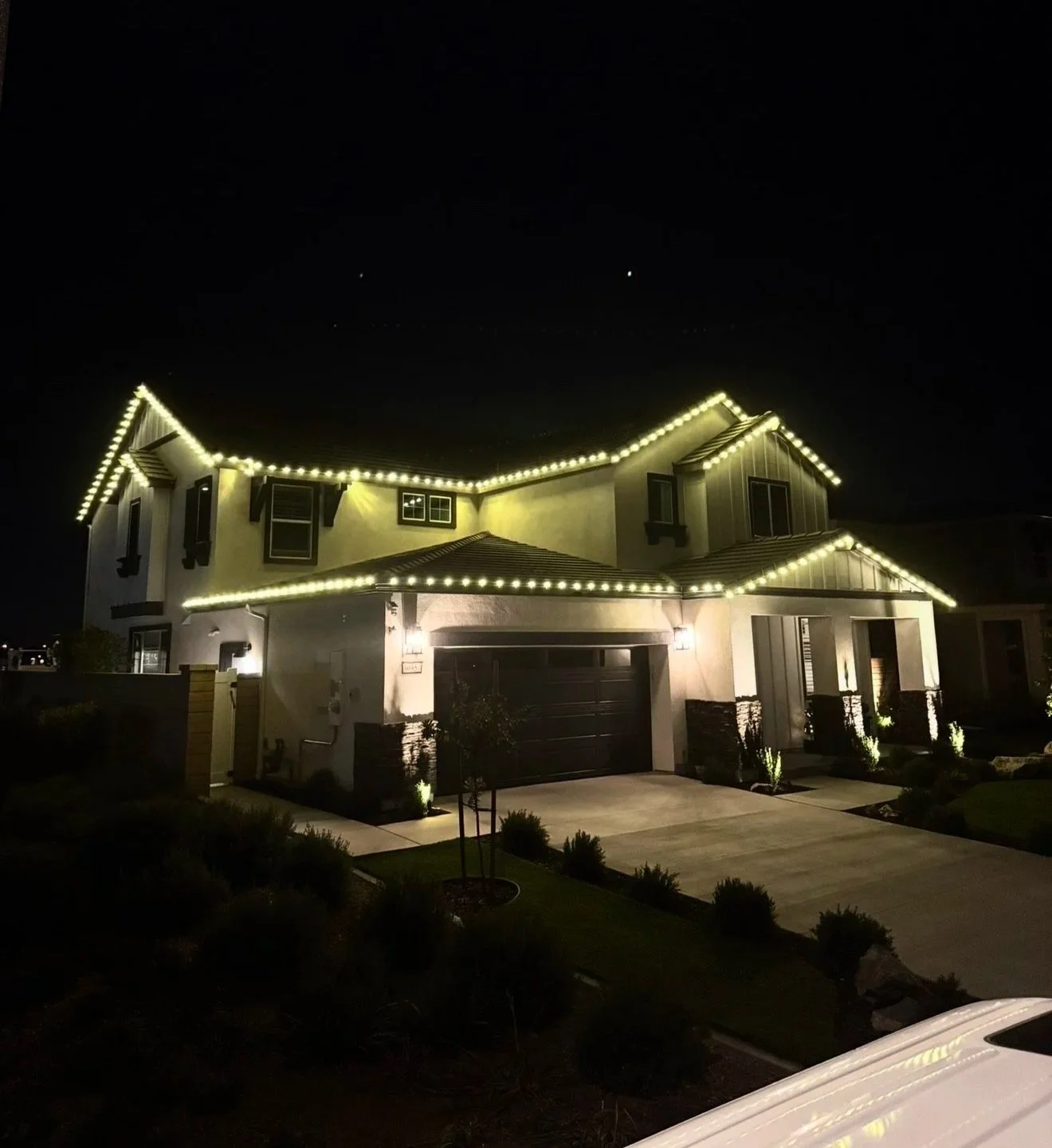 Holiday lighting installation at night