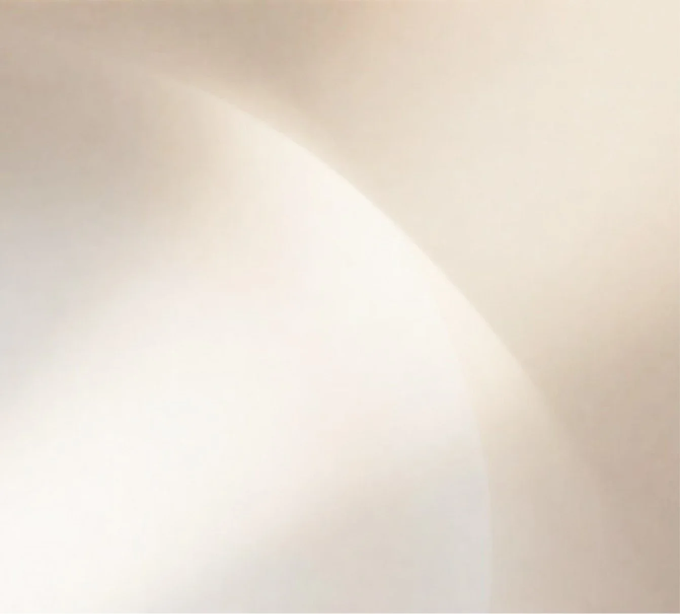 Abstract light-colored surface with soft shadows and curved lines.
