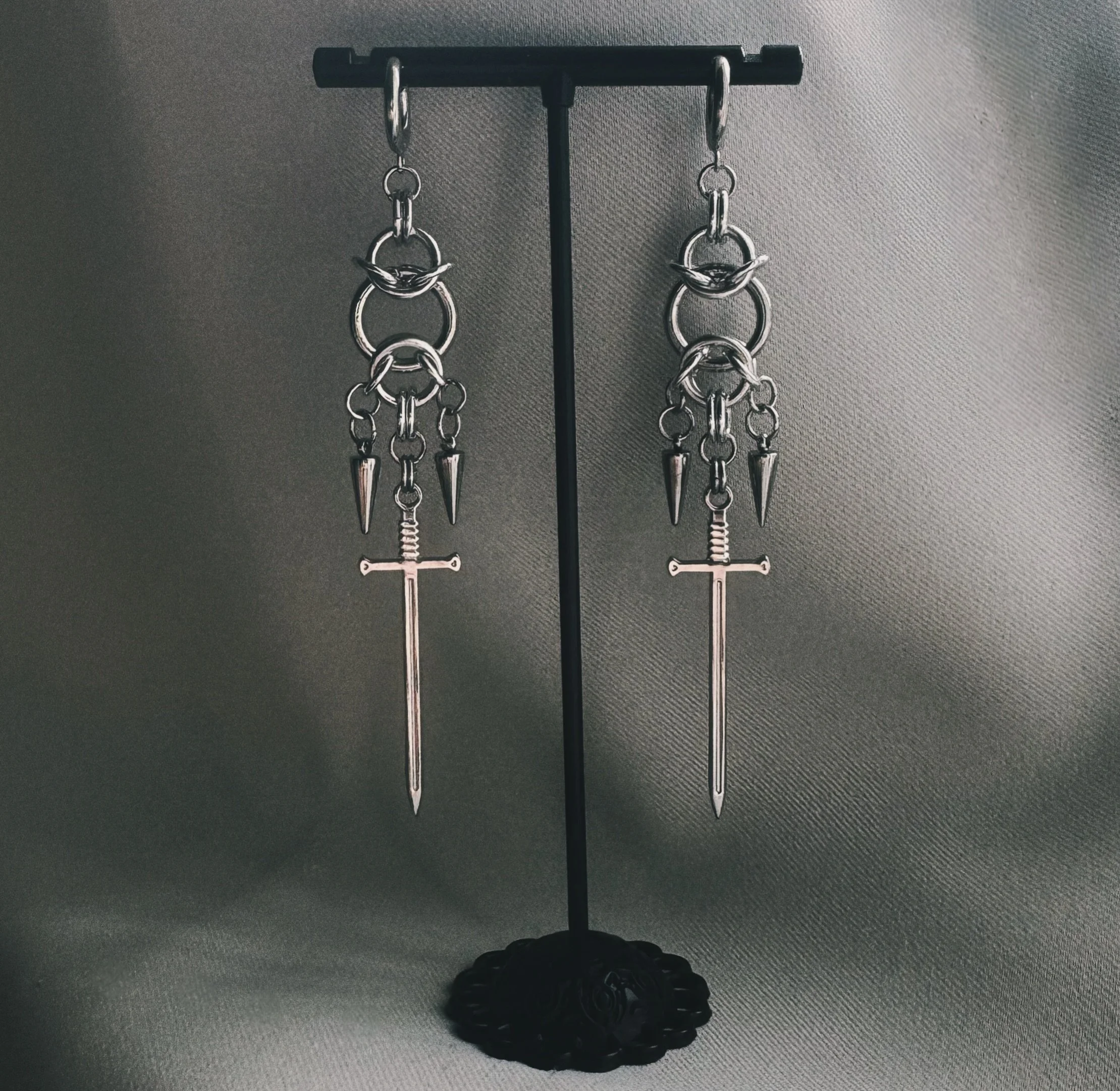 these gorgeous one-of-a-kind earrings found their home with @nailboutiquebykc but i&rsquo;m planning on whipping up some more new designs with swords! 🗡️ 

#chainmail #chainmaille #chainmailearrings #chainmaillejewelry #sword