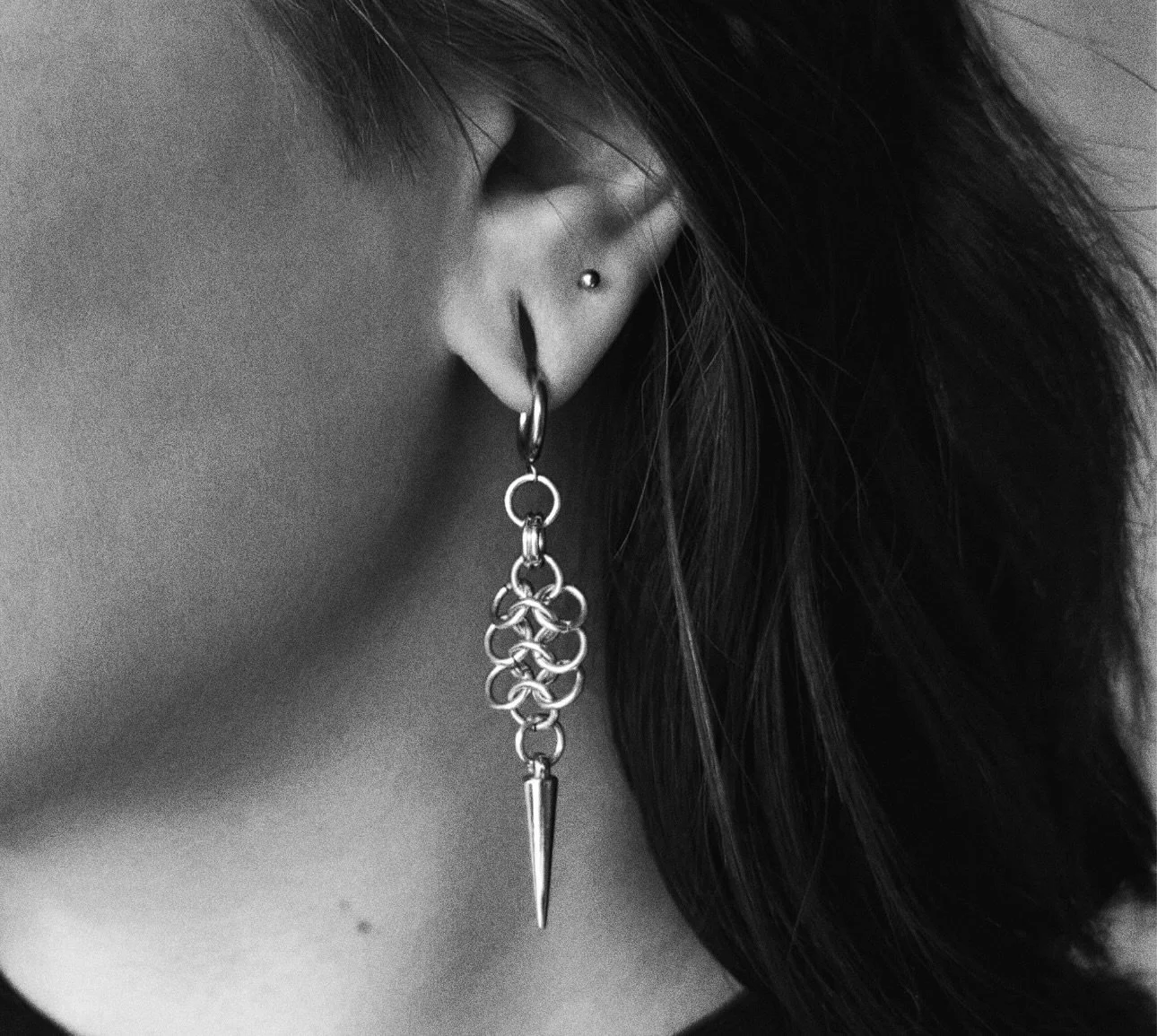 emily in prototype impaler earrings