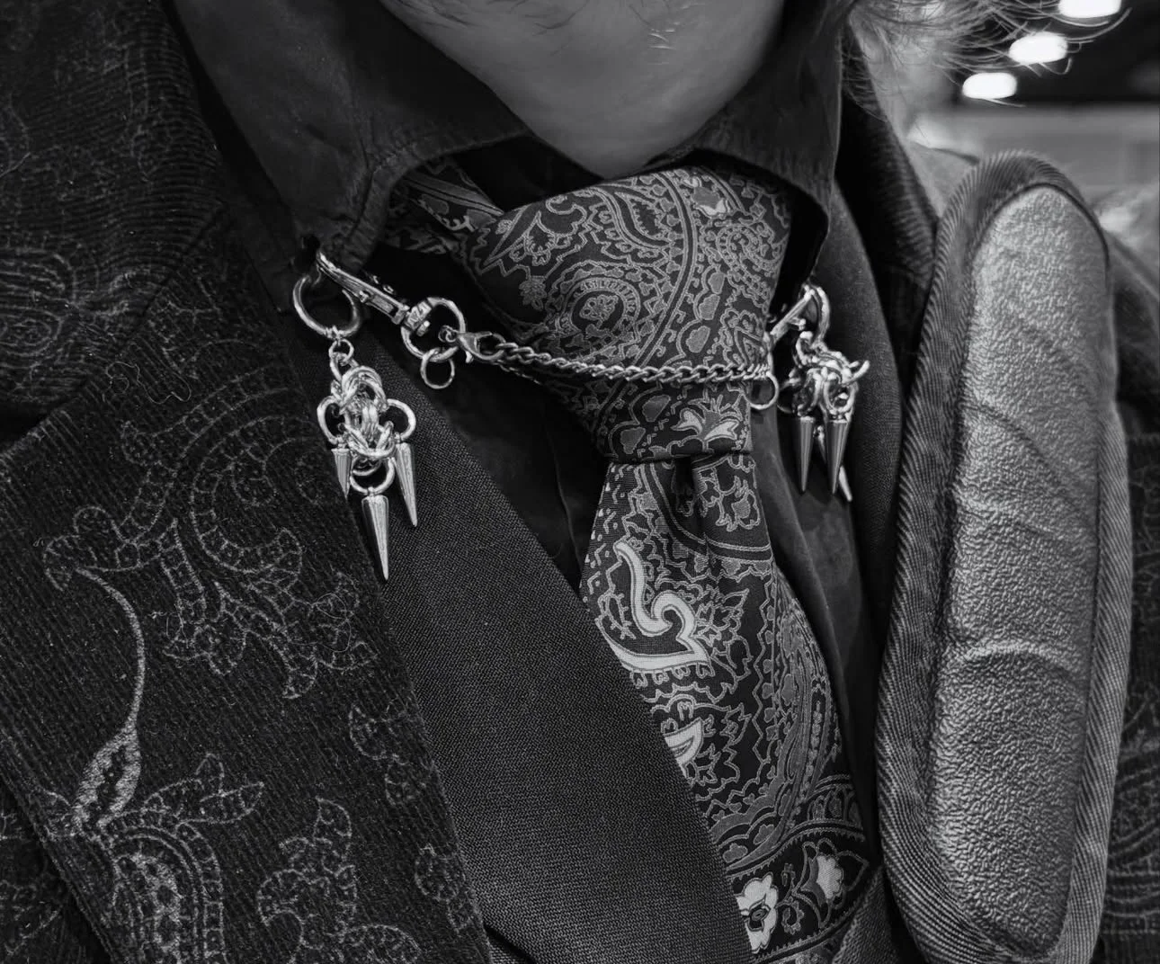 trefoil earrings used as tie accessories