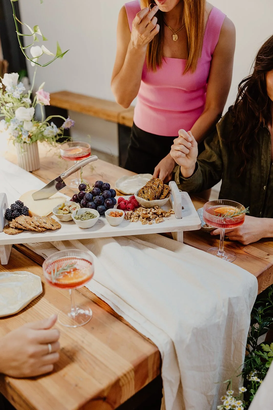 Premium wine and grazing setup for a classy hens party in Perth with pottery tools and ceramic workshop styling.