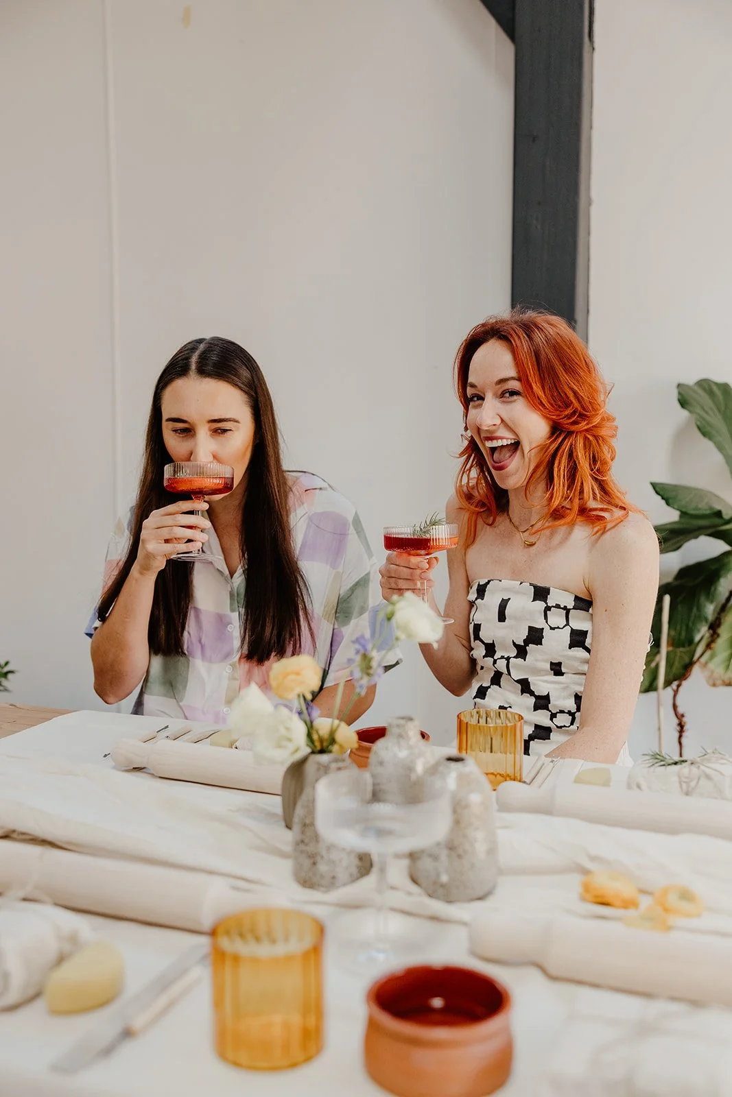 Group of women enjoying a pottery hens party workshop in Fremantle Perth with wine and hand building ceramics at Happy Hub Collective.