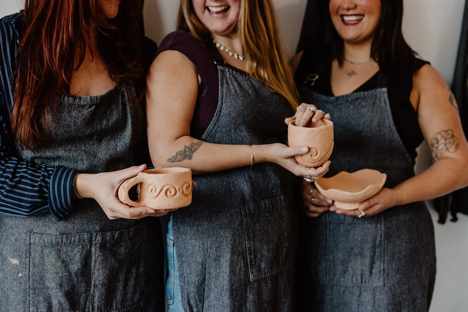 On-site corporate pottery workshop setup in a Perth office space for creative team building event.