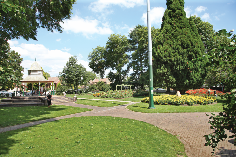 ABOVE THE HARRY SPRINGETT BAND ROTUNDA, COMPLETED IN 1996, REPLACED THE 1914 BANDSTAND, WHICH WAS REMOVED IN THE 1960S. BELOW TULIP TIME LAST YEAR.