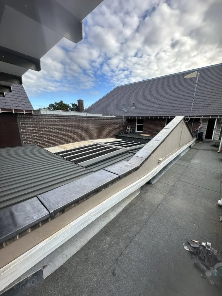 Lead weather and lead capping on wall.