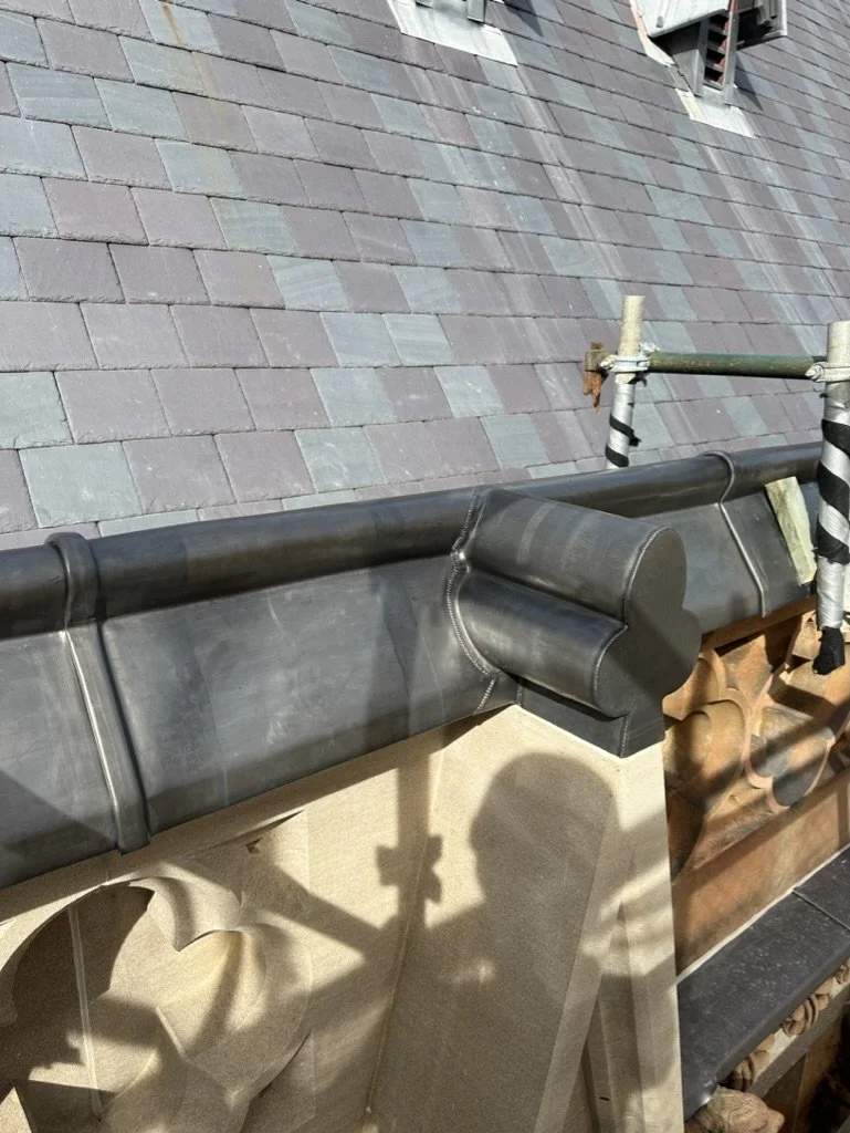 Bespoke lead weathering and capping on old sandstone building